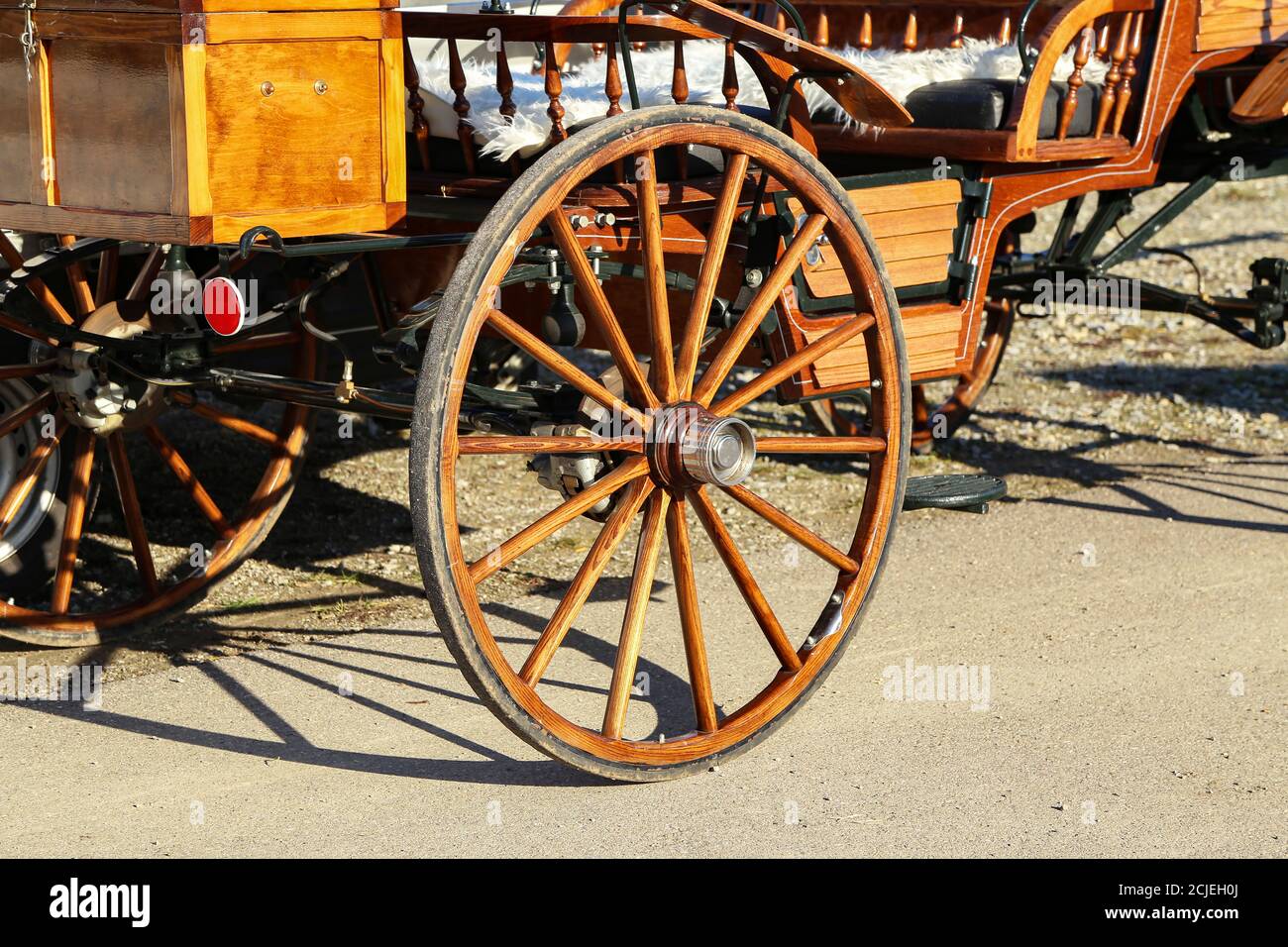 Closeup shot of a wheel of a stagecoach Stock Photo Alamy