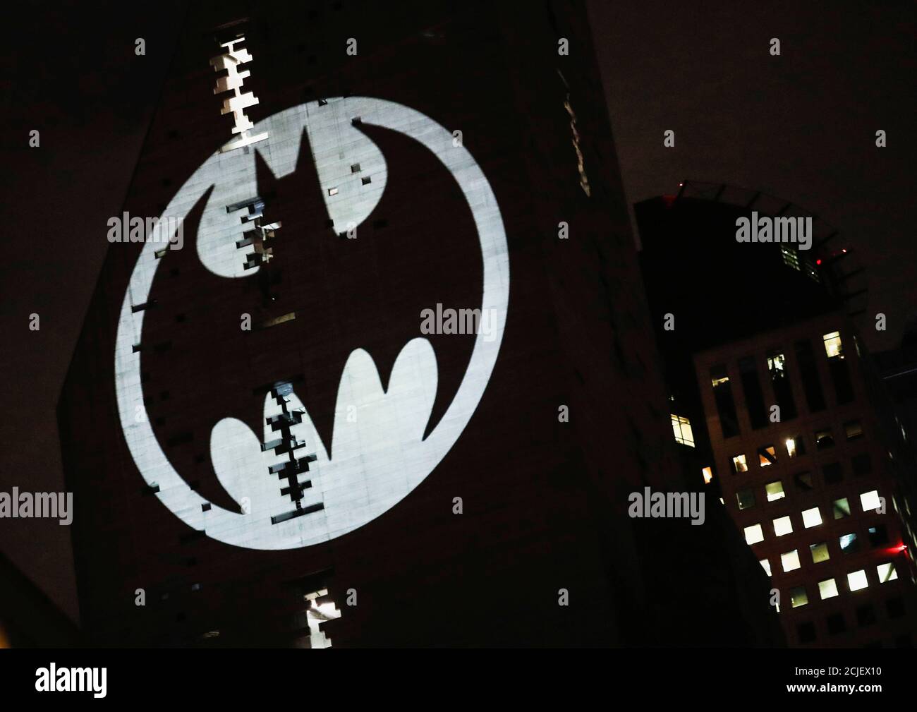 A Bat-Signal is projected onto a building at night as Batman fans celebrate  the 80th anniversary of the first appearance of the DC Comics superhero, in  Mexico City, Mexico September 21, 2019.