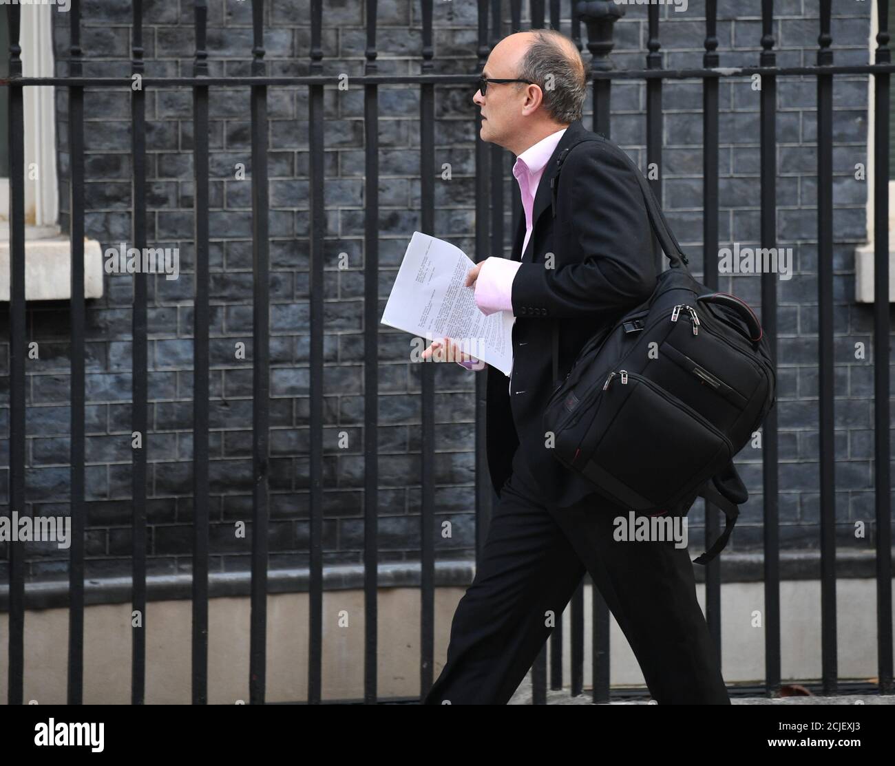 Senior aide to Prime Minister Boris Johnson, Dominic Cummings, carrying a copy of a 1986 archive letter from retired USAF General B A Schriever to David Packard, chairman of the President's Blue Ribbon Commission on Defense Management, as he arrives in Downing Street, London, ahead of a Cabinet meeting at the Foreign and Commonwealth Office. Stock Photo