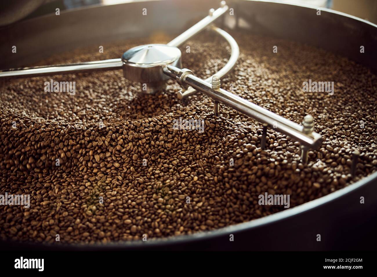Cooling tray with brown roasted coffee beans Stock Photo Alamy