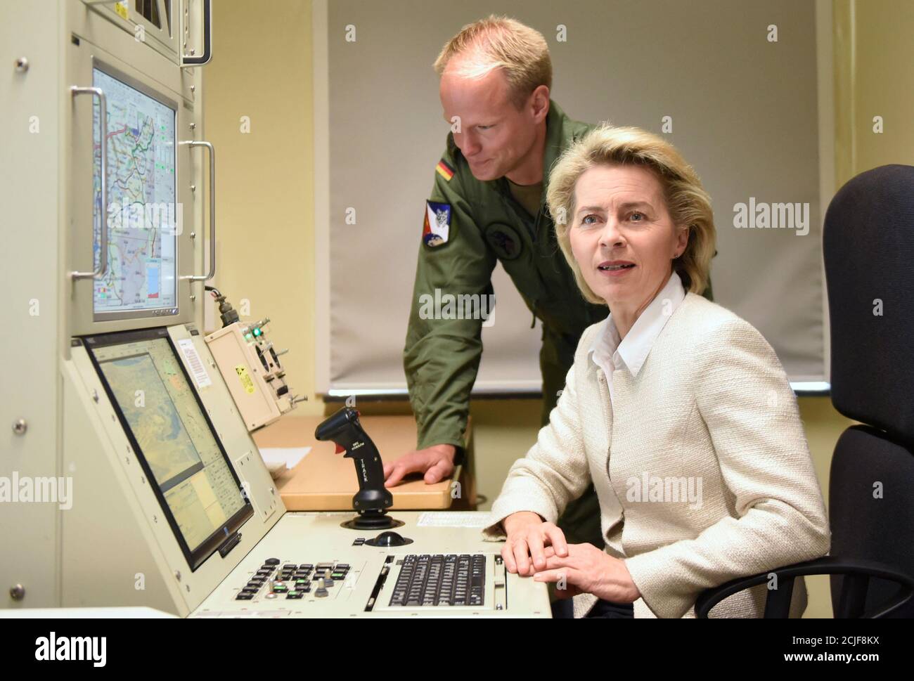 German Defence Minister Ursula von der Leyen is seen at a drone simulator during her visit at the Tactical Air Force Wing 51 'Immelmann'  at German army Bundeswehr airbase in Jagel near the German-Danish border, August 17, 2016. REUTERS/Fabian Bimmer Stock Photo