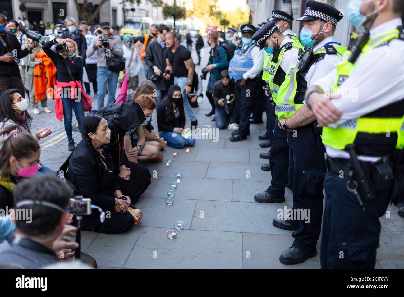 Vigil during 'Rebels for Amazonia' Extinction Rebellion march on Indigenous Womens Day, Brazilian Embassy, London, 5 September 2020 Stock Photo