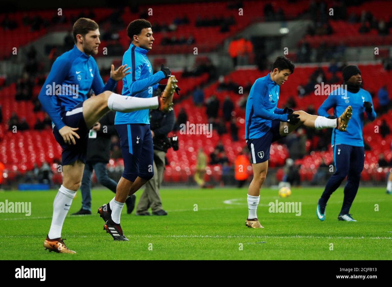 Soccer Football - Premier League - Tottenham Hotspur vs West Ham United - Wembley Stadium, London, Britain - January 4, 2018   Tottenham's Son Heung-min, Dele Alli and Ben Davies warm up before the match   REUTERS/Eddie Keogh    EDITORIAL USE ONLY. No use with unauthorized audio, video, data, fixture lists, club/league logos or 'live' services. Online in-match use limited to 75 images, no video emulation. No use in betting, games or single club/league/player publications.  Please contact your account representative for further details. Stock Photo