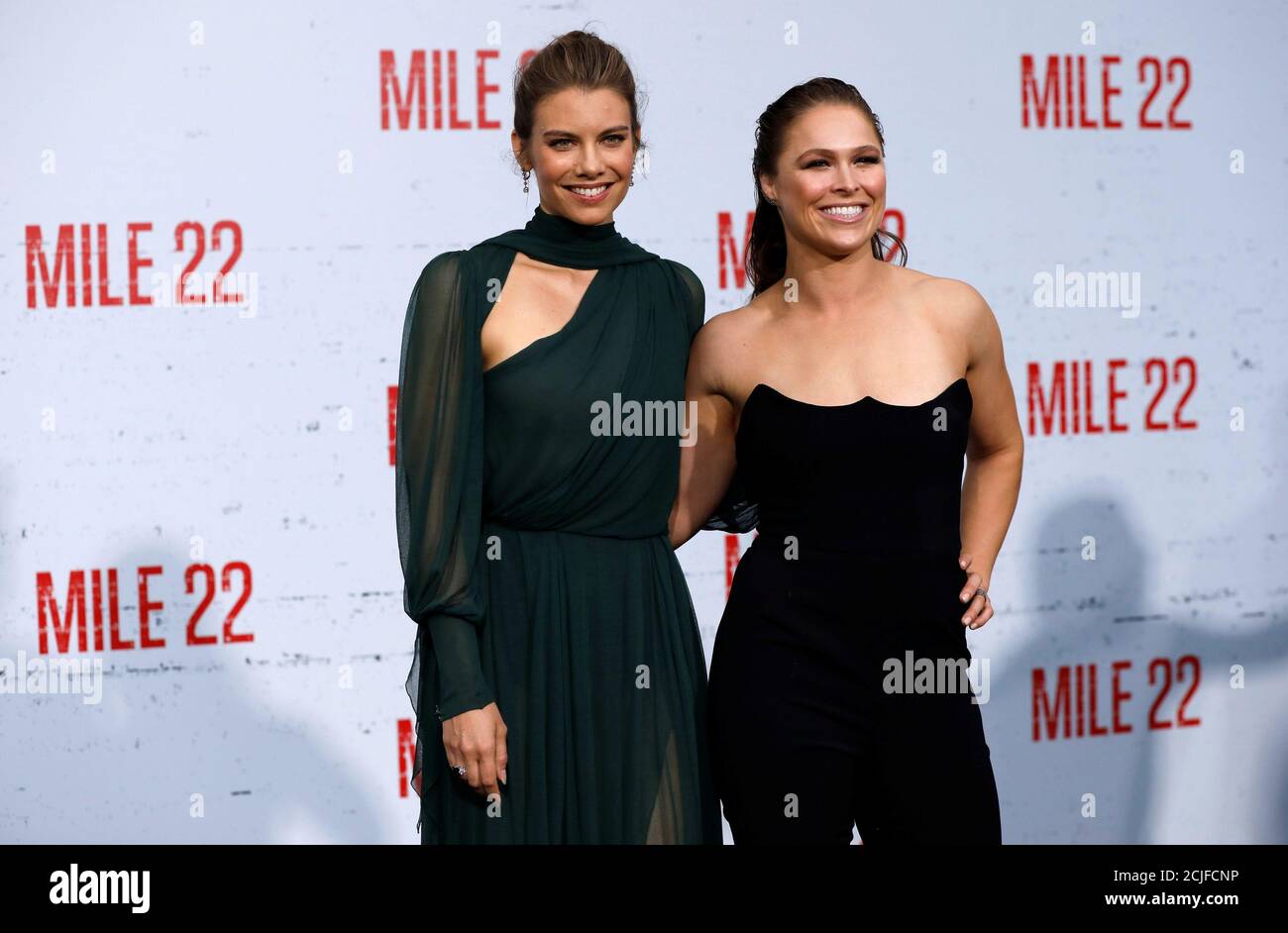 Cast members Lauren Cohan (L) and Ronda Rousey pose at the premiere for "Mile  22" in Los Angeles, California, U.S., August 9, 2018. REUTERS/Mario Anzuoni  Stock Photo - Alamy