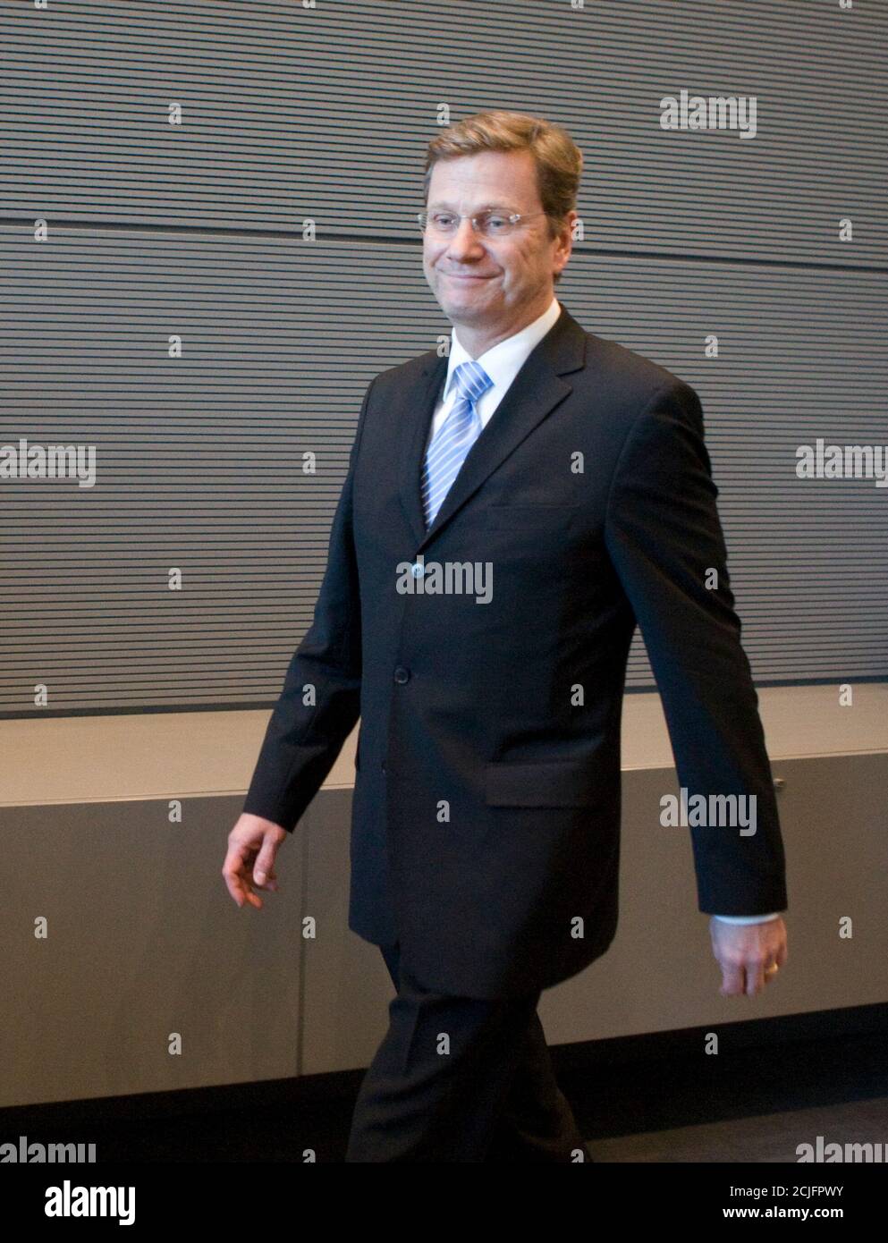 Leader of the Free Democrats Party (FDP) Guido Westerwelle arrives for a FDP parliamentary group meeting in Berlin October 20, 2009.  REUTERS/Thomas Peter (GERMANY POLITICS) Stock Photo