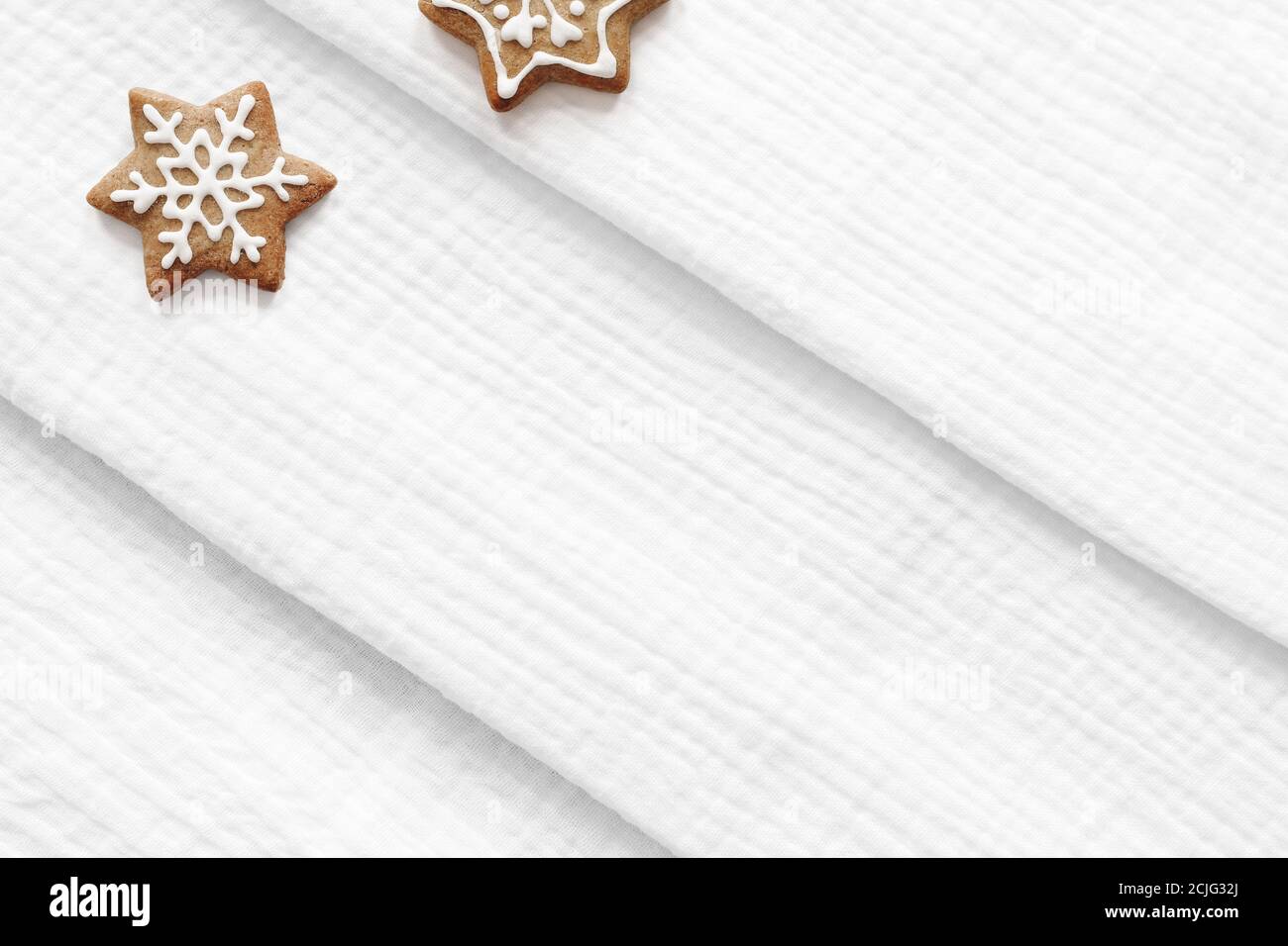 Download Christmas Fabric Mockup Scene Closeup Of White Folded Muslin Cotton Textile Star Shaped Gingerbread Cookies With Decorative Sugar Frosting Holiday Stock Photo Alamy