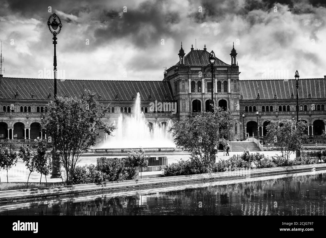 SEVILLA, SPAIN - JUNE Circa, 2020. wide angle Panorama of the Spain Square Plaza de Espana in Seville, with bridges over the canal, lake, fountain, to Stock Photo