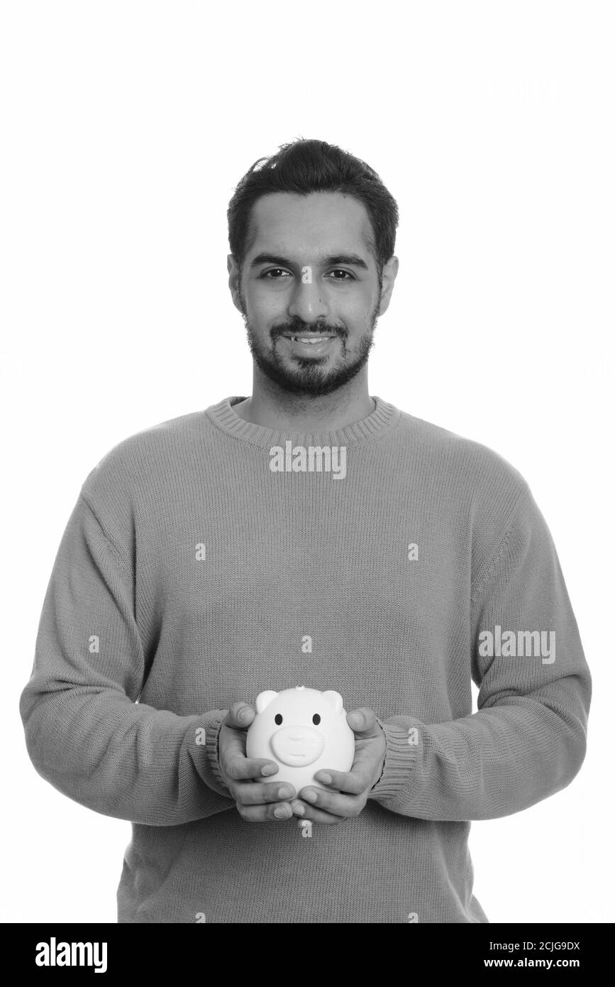 Young Happy Indian Man Holding Piggy Bank Stock Photo Alamy