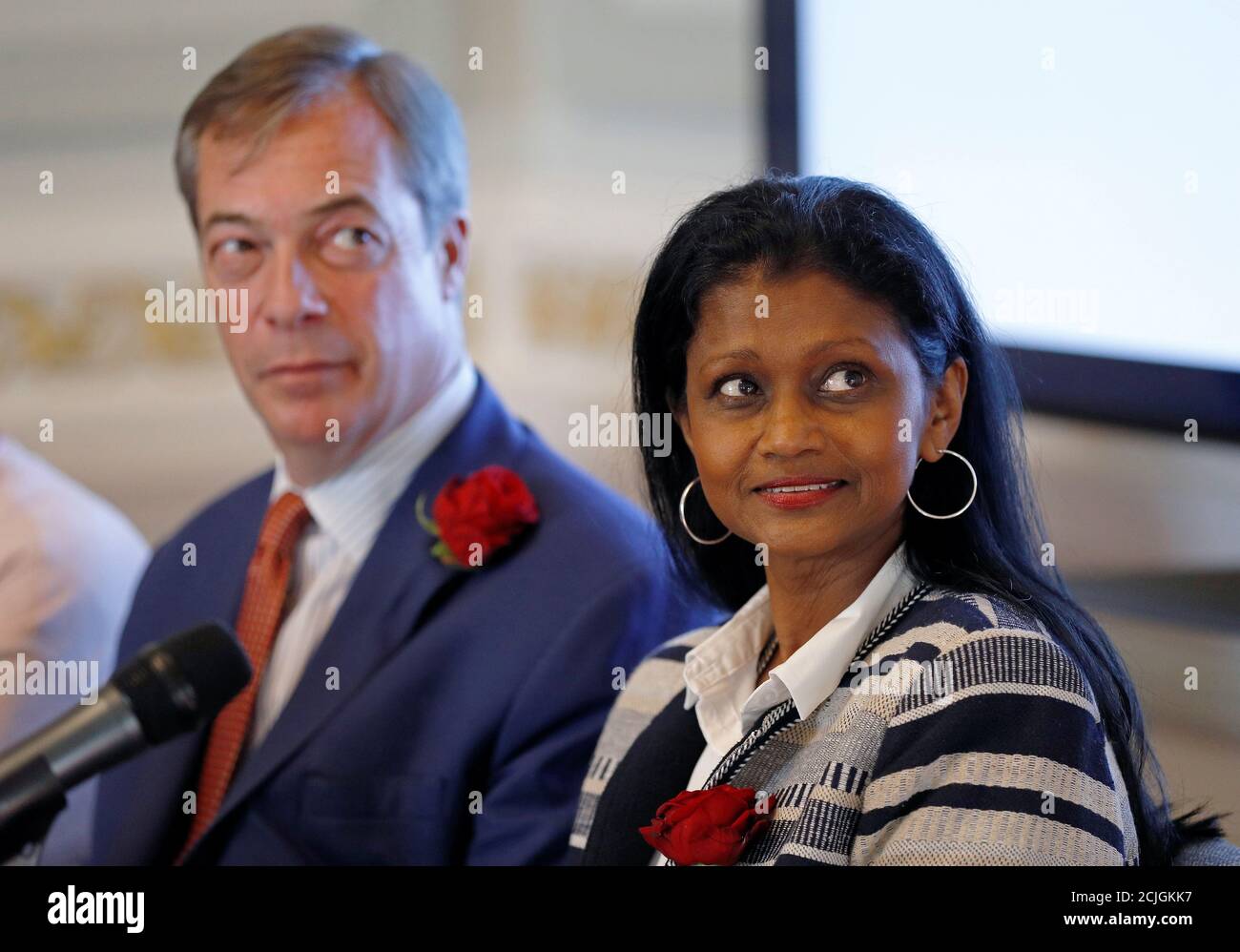 Brexit campaigner and Member of the European Parliament Nigel Farage and Christina Jordan, a candidate of Brexit party, look on during a news conference the 'Brexit Party' campaign for the European