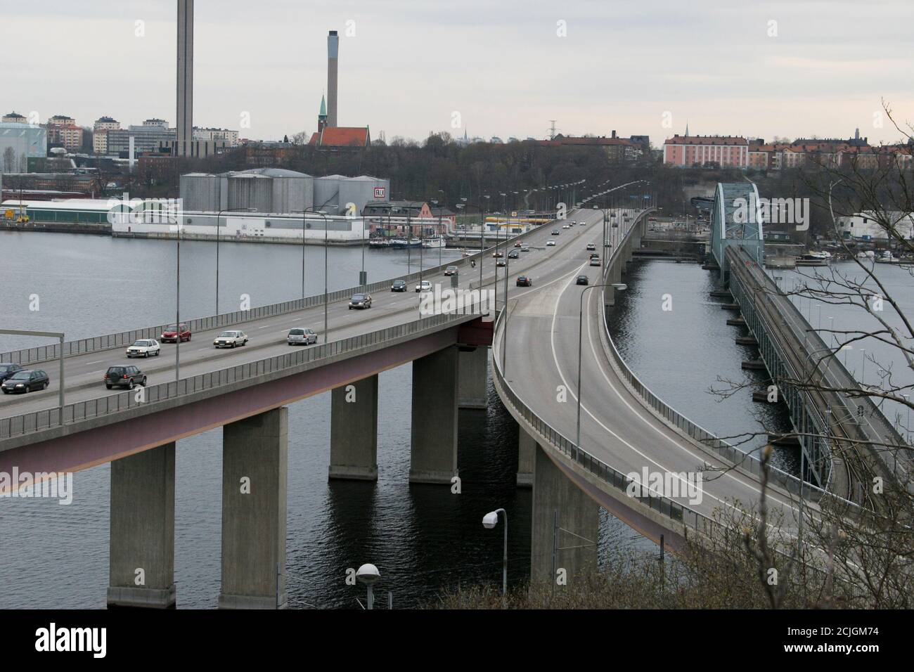 LIDINGÖ BRIDGE Stockholm Sweden the new to left and the old t right connect Island and town Lidingö with the rest of Stockholm area Stock Photo