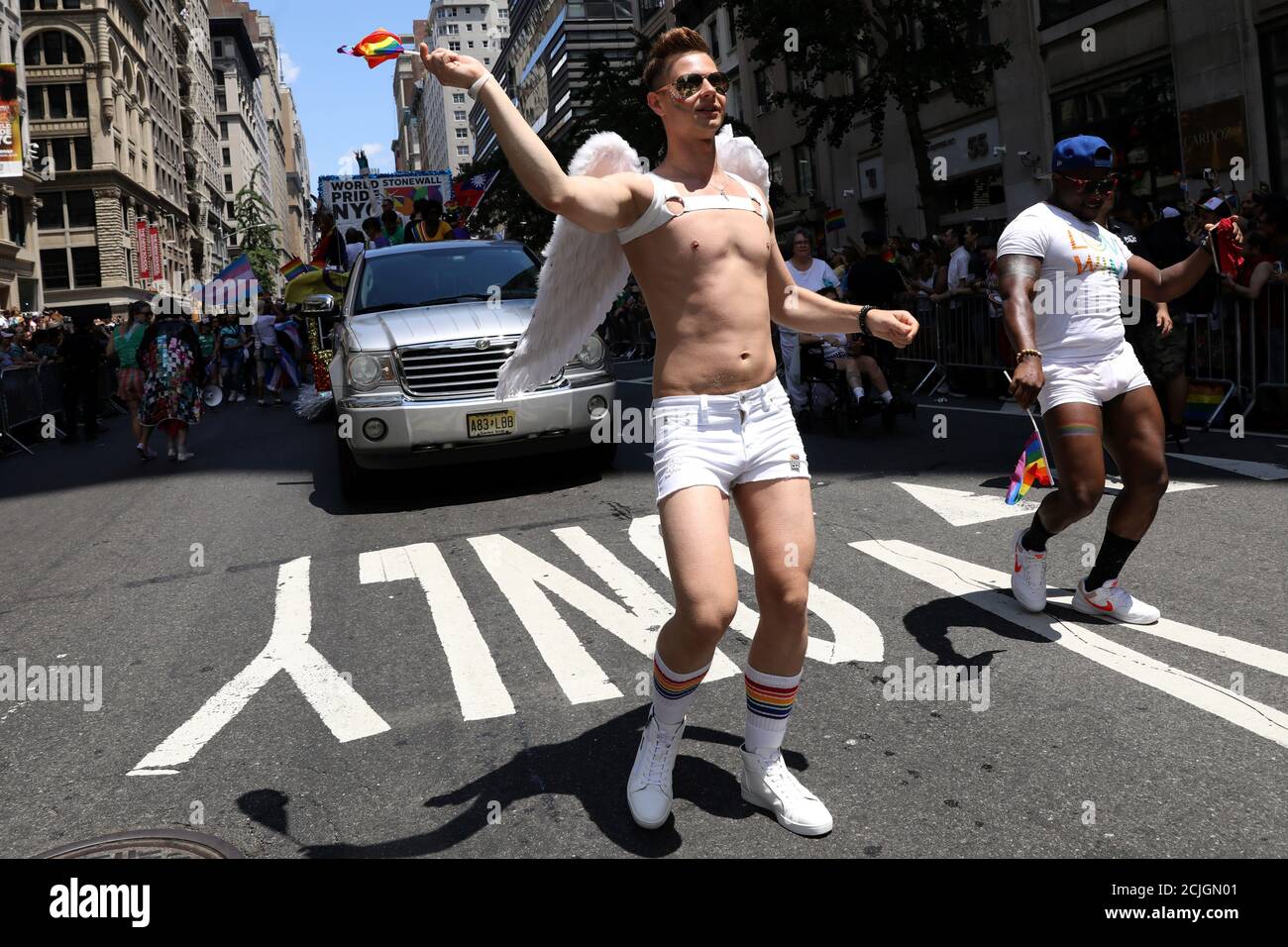 People participate in the 2019 World Pride NYC and Stonewall 50th LGBTQ Pride parade in New York, U.S., June 30, 2019.  REUTERS/Brendan McDermid Stock Photo