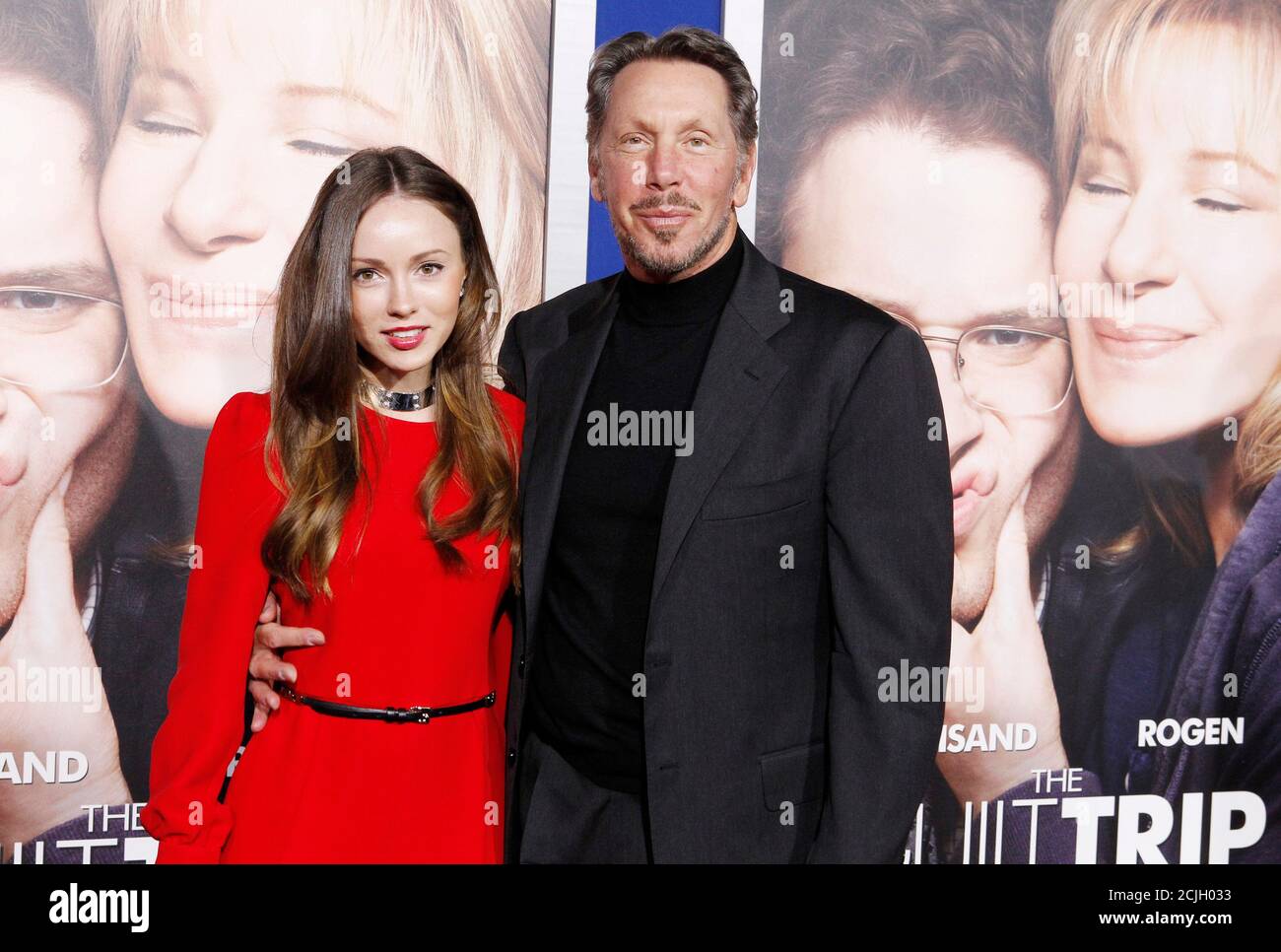 Larry Ellison (R), co-founder and CEO of Oracle Corporation, and Nikita  Kahn arrive at the premiere of "The Guilt Trip" starring Barbra Streisand  and Seth Rogen in Los Angeles December 11, 2012.