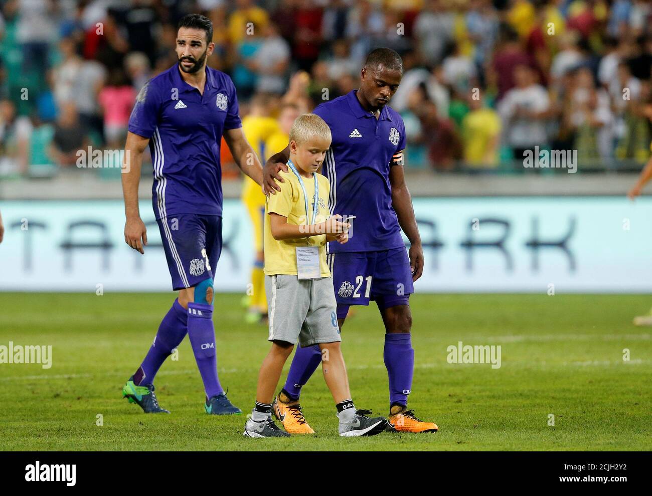 Soccer Football Europa League Playoffs Nk Domzale V Olympique Marseille Lubljana Slovenia August 17 2017 Marseille S Patrice Evra And Adil Rami After The Match Reuters Srdjan Zivulovic Stock Photo Alamy