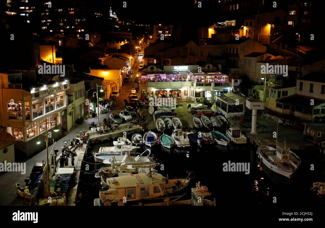 Restaurants "Fonfon" and "Chez Jeannot" are seen at night in the Vallon des  Auffes harbour in Marseille, France, September 13, 2017. Picture taken  September 13, 2017. REUTERS/Jean-Paul Pelissier Stock Photo - Alamy