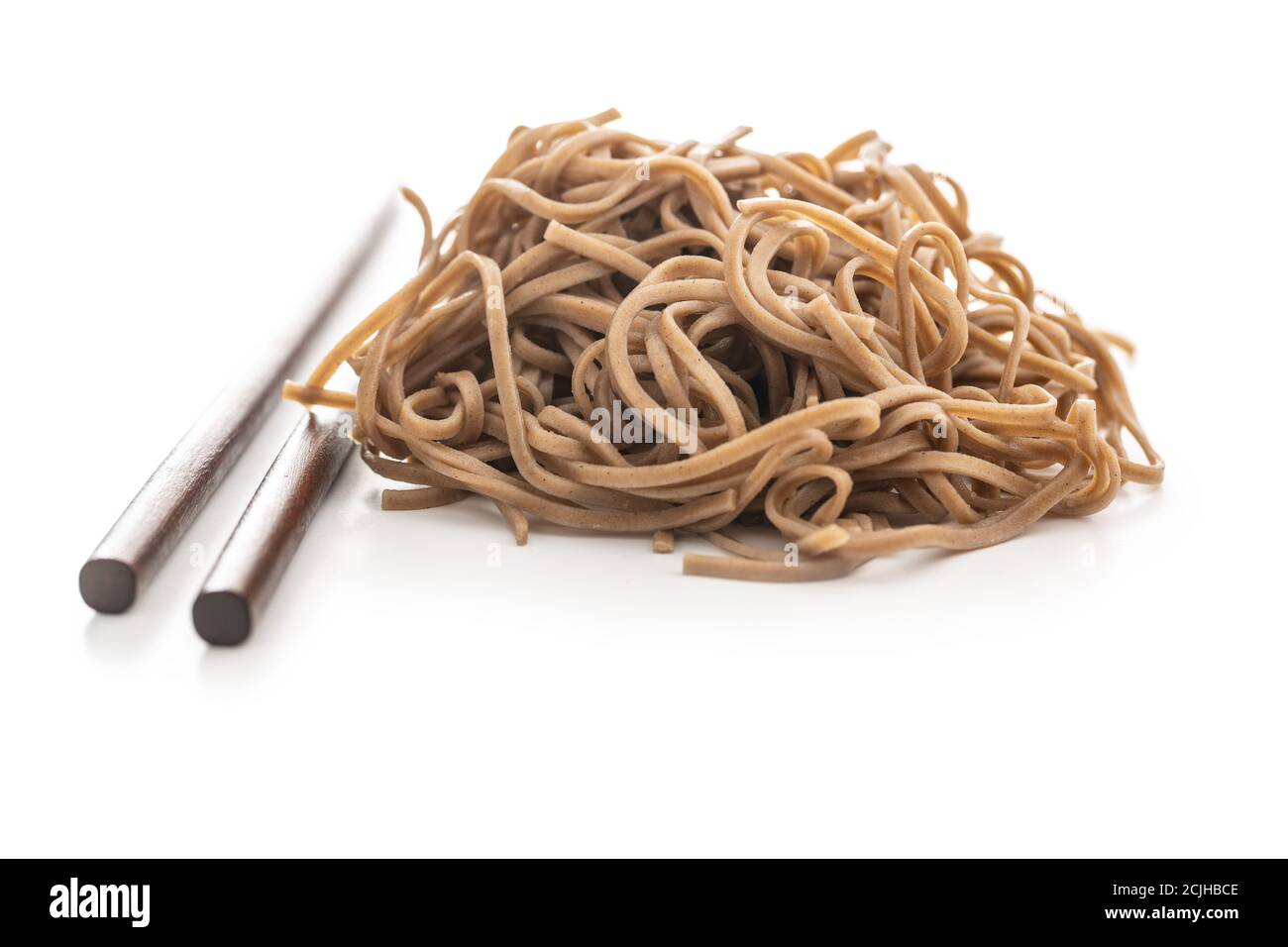 Cooked soba noodles. Traditional asian pasta isolated on white background. Stock Photo