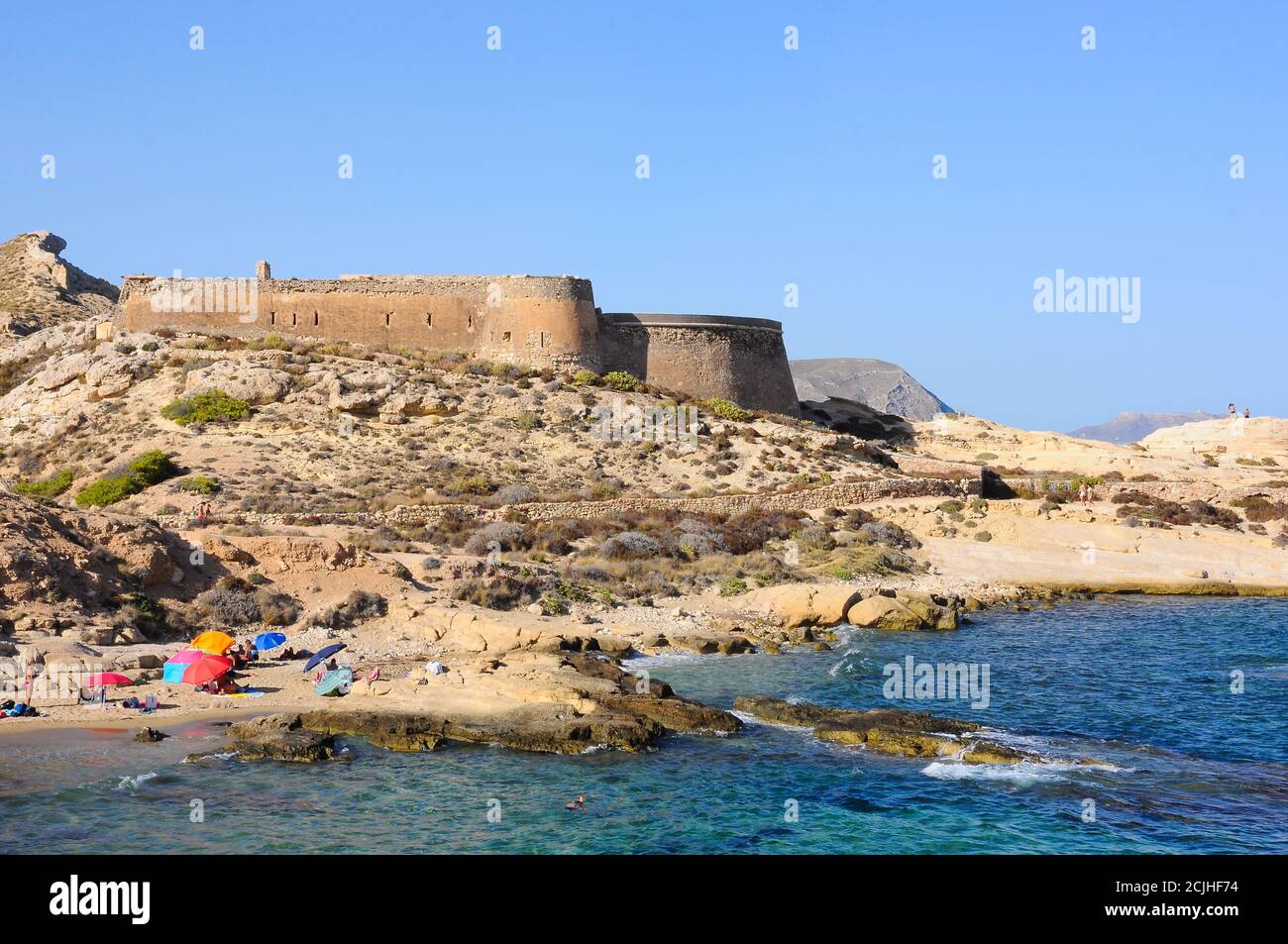 San Ramon Castle in El Playazo de Rodalquilar. Cabo de Gata Natural Park, Almeria, Spain Stock Photo