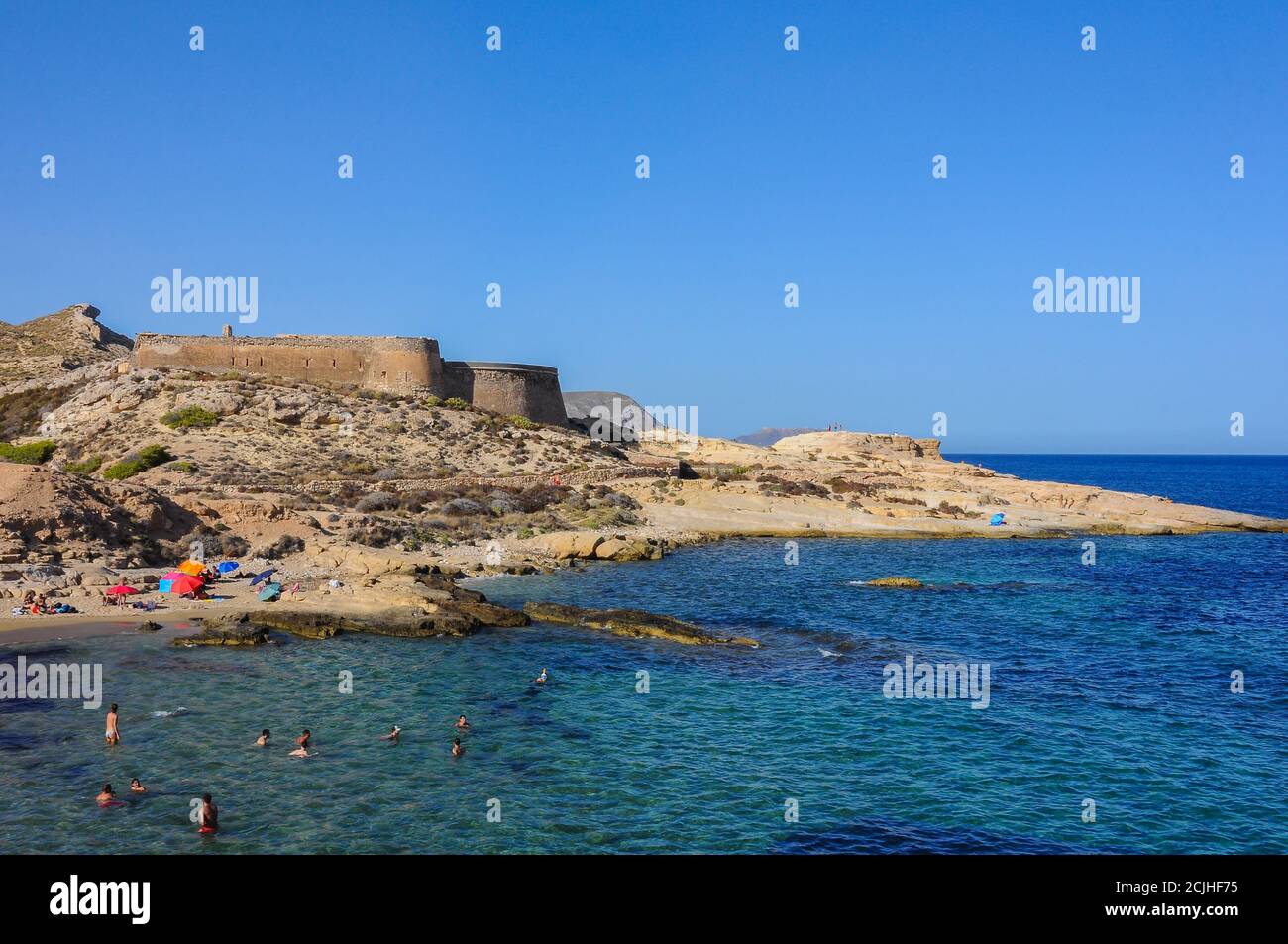 Beautiful scene of San Ramon Castle and El Playazo de Rodalquilar. Cabo de Gata Natural Park, Almeria, Spain Stock Photo