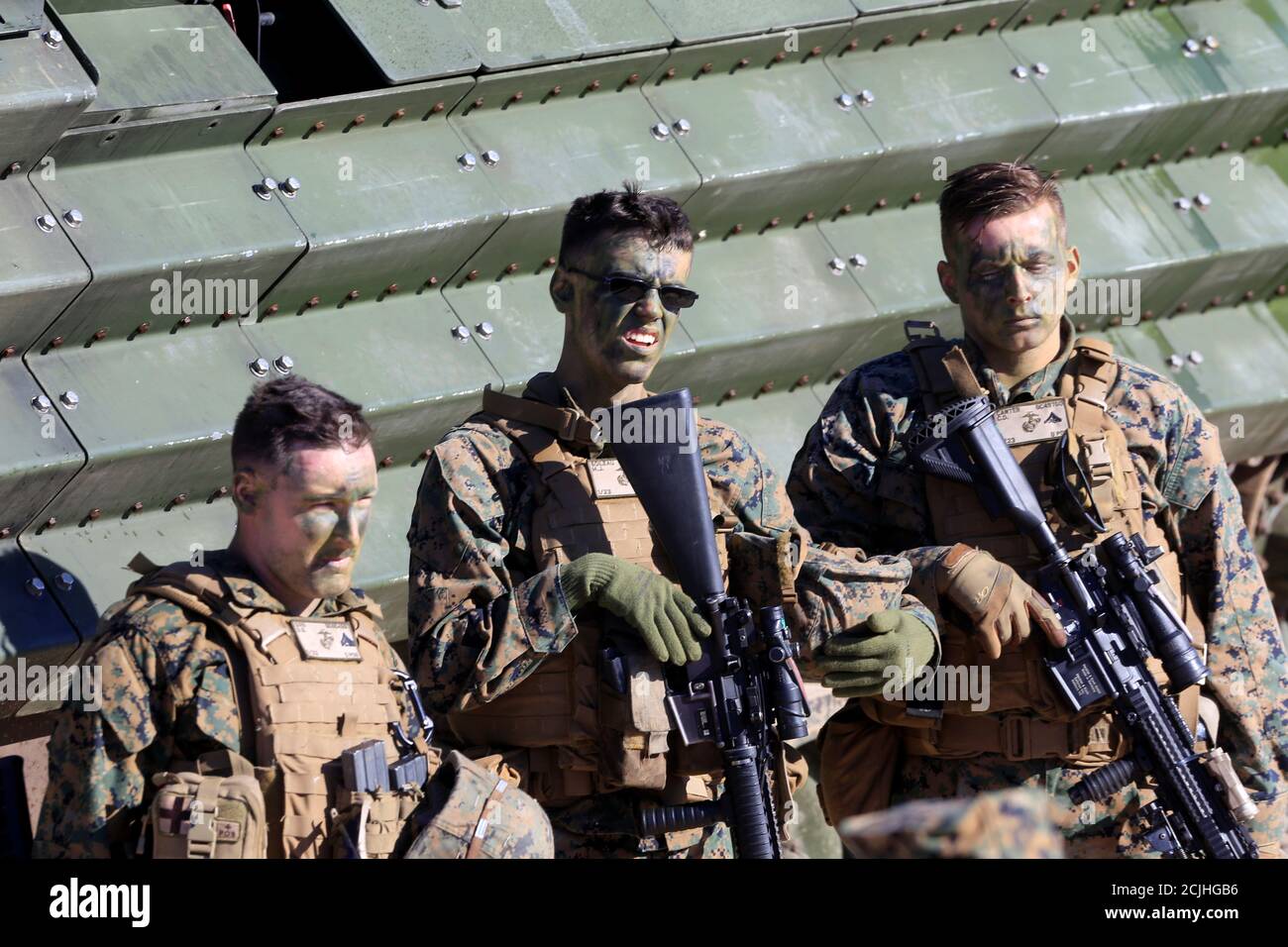 U.S. navy marines take a break during annual recurring multinational, maritime-focused NATO exercise BALTOPS 2017, near Ventspils, Latvia, June 6, 2017. REUTERS/Ints Kalnins Stock Photo
