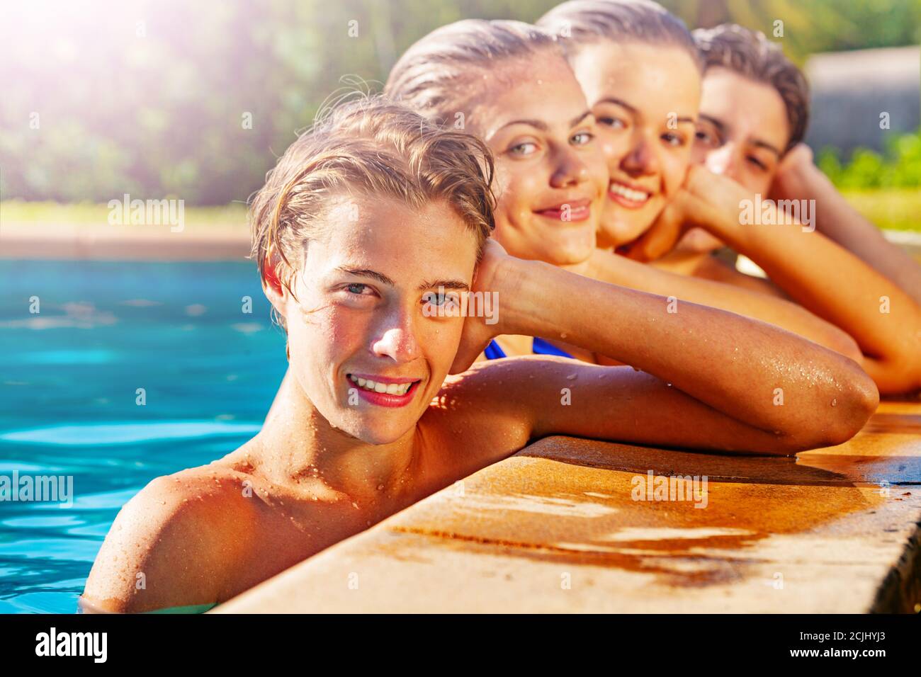 Teens in swimming pool hi-res stock photography and images - Alamy