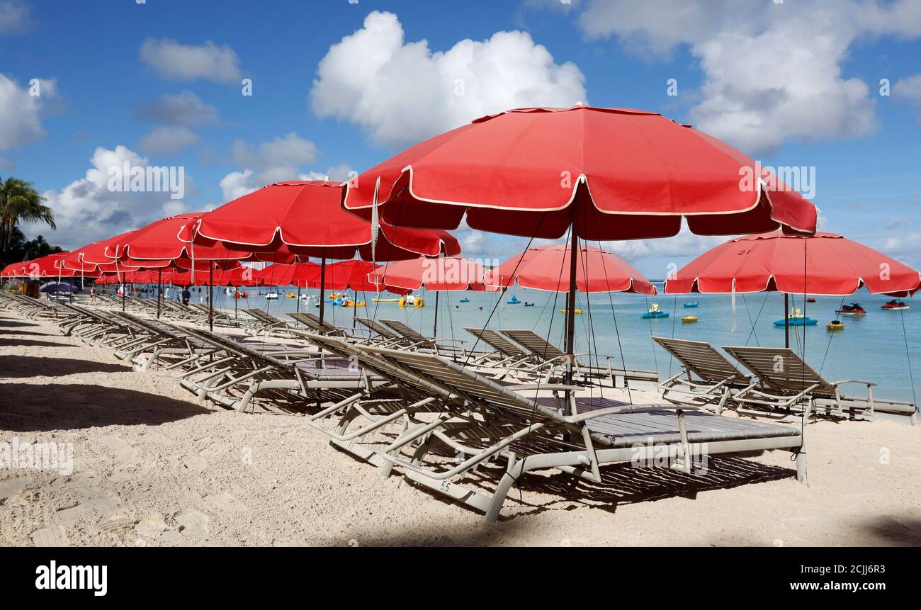 A view of empty daybeds along a beach in Tumon bay on the island of Guam, a U.S. Pacific Territory, August 14, 2017.  REUTERS/Erik De Castro Stock Photo