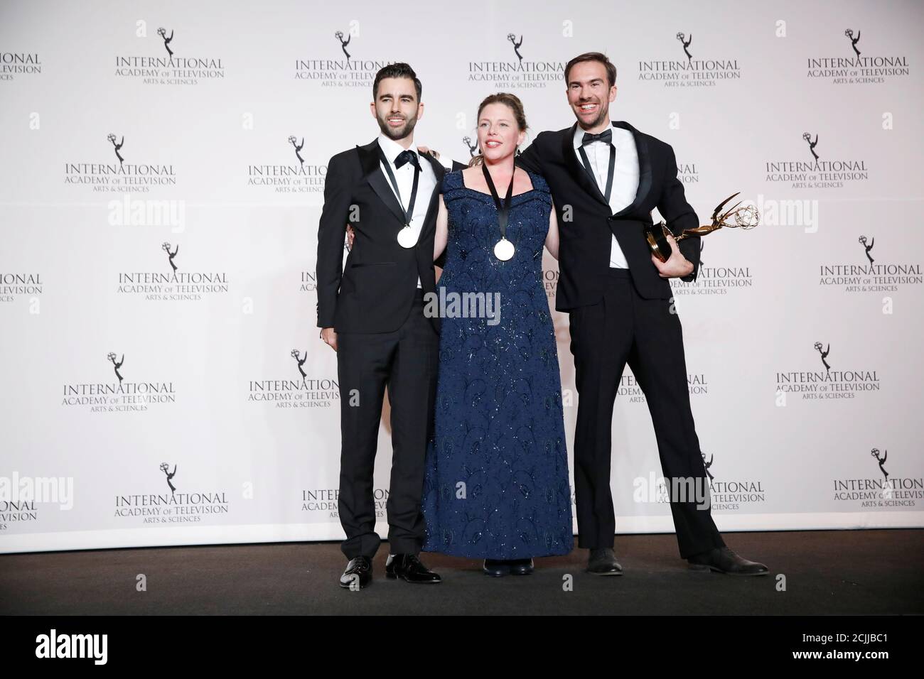 L-R) Rutger Lemm, Marloes Blokker and Stephane Kaas pose with their award  for Arts Programming for their show "Etgar Keret: Based on a True Story" at  the International Emmy Awards in Manhattan,