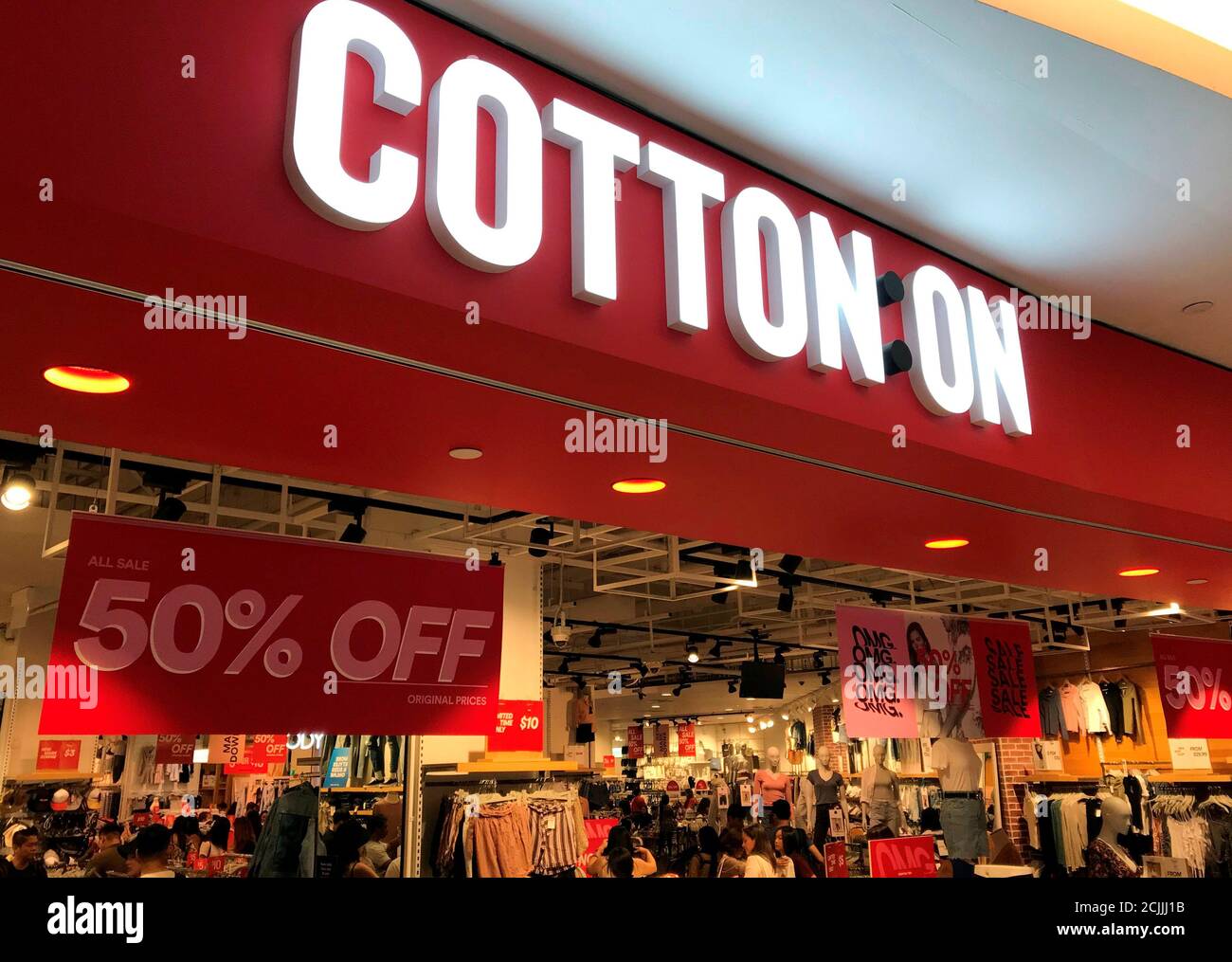 Shoppers visit Cotton On outlet on Christmas Eve in Singapore December 24,  2019. REUTERS/Koustav Samanta Stock Photo - Alamy