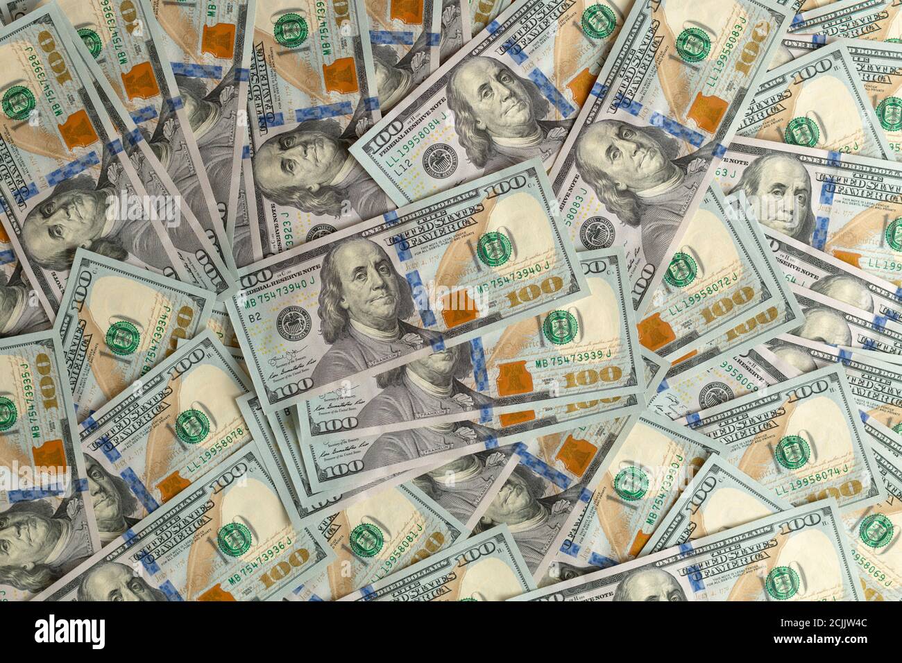 background with a lot of 100 dollar bills Stock Photo