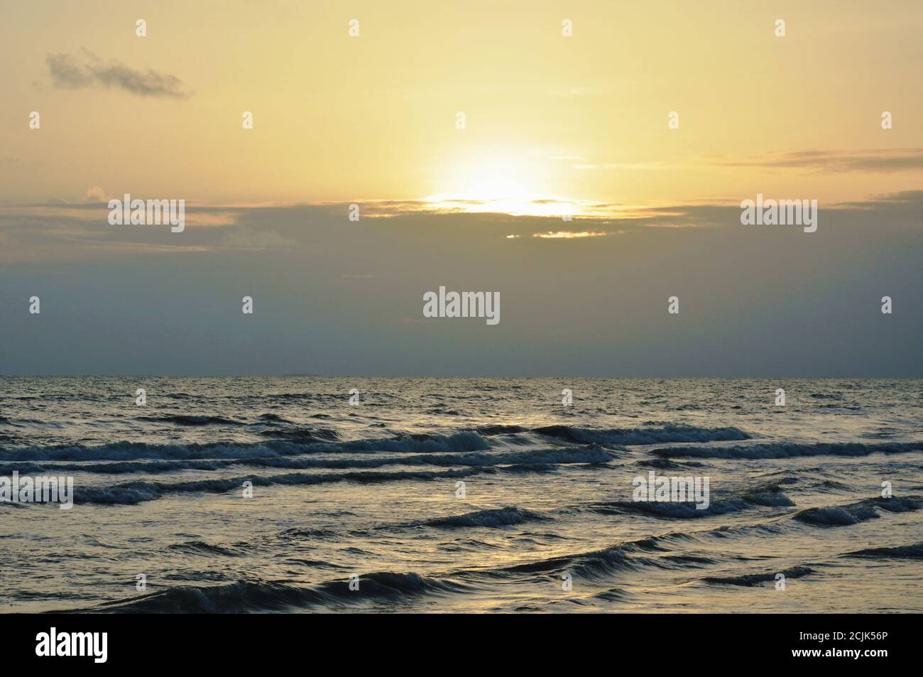 landscape of sea and water surf to beach in sunset Stock Photo - Alamy