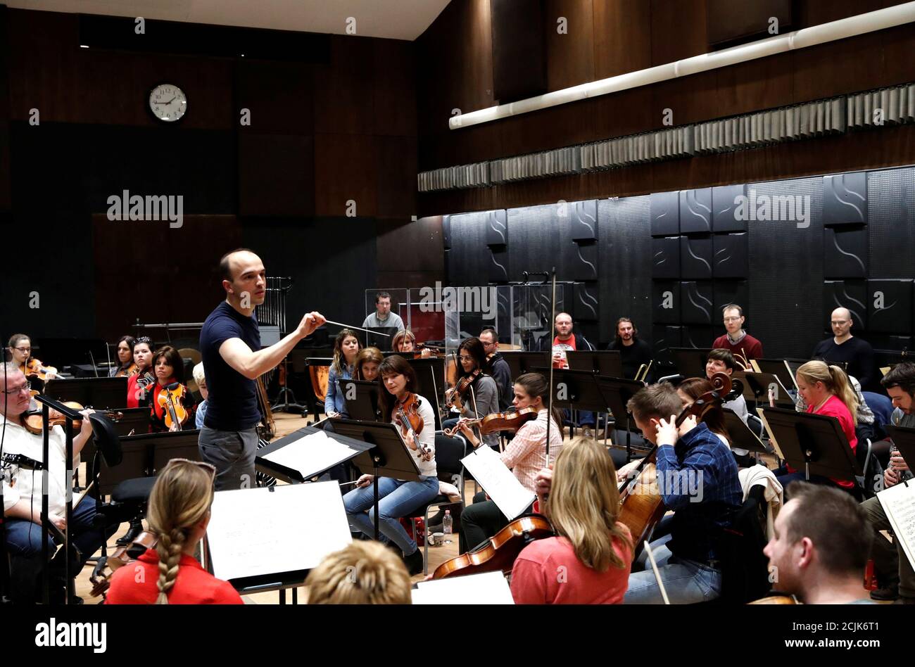 Conductor Mate Hamori conducts the Danubia Orchestra during a rehearsal in  Budapest, Hungary, February 5, 2020. Picture taken Februay 5, 2020.  REUTERS/Bernadett Szabo Stock Photo - Alamy