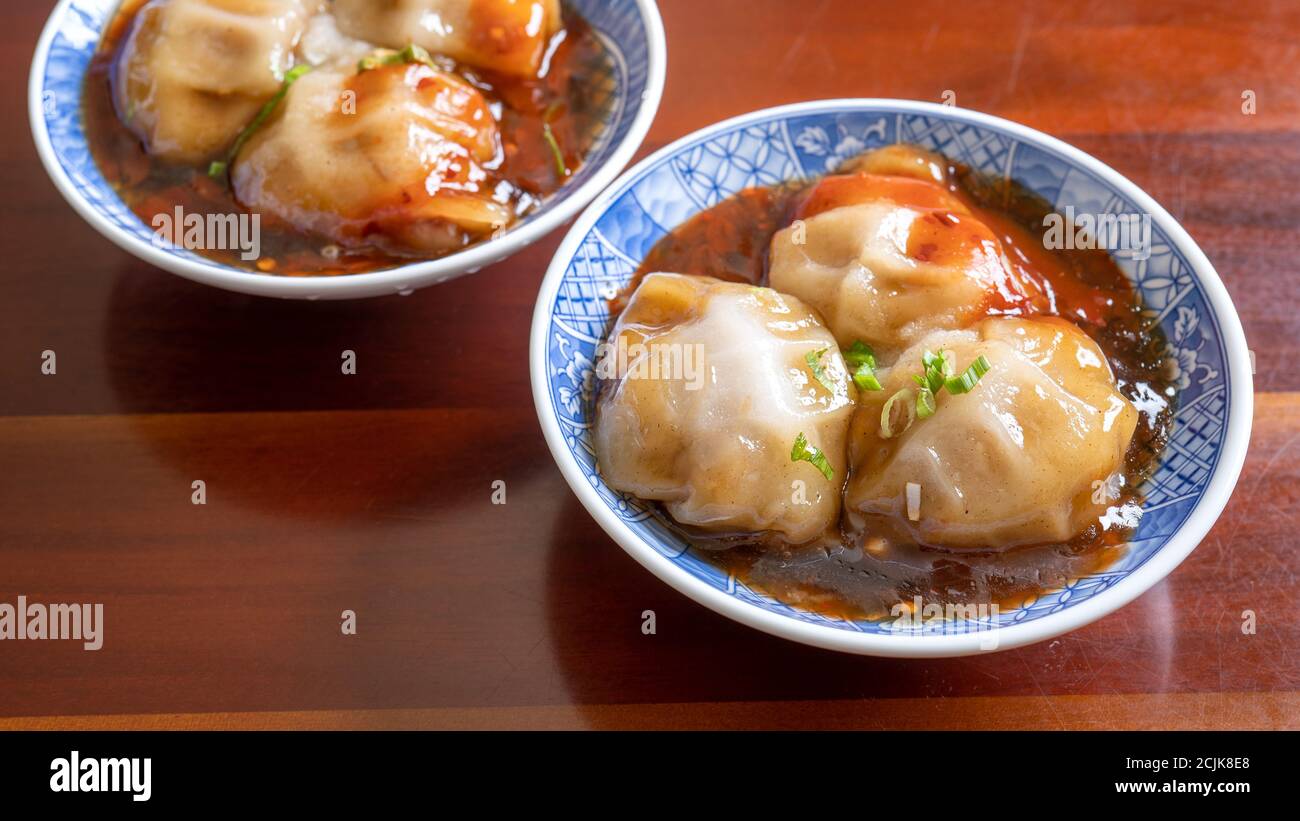 Bawan (Ba wan), Taiwanese meatball delicacy, delicious street food, steamed starch wrapped round shaped dumpling with pork inside, close up, copy spac Stock Photo