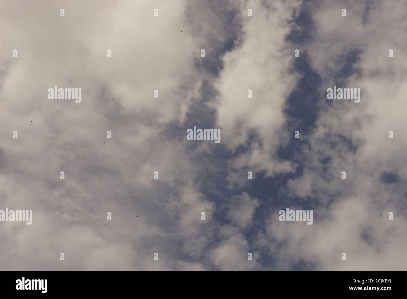 Natural background of blue sky with white clouds Stock Photo - Alamy