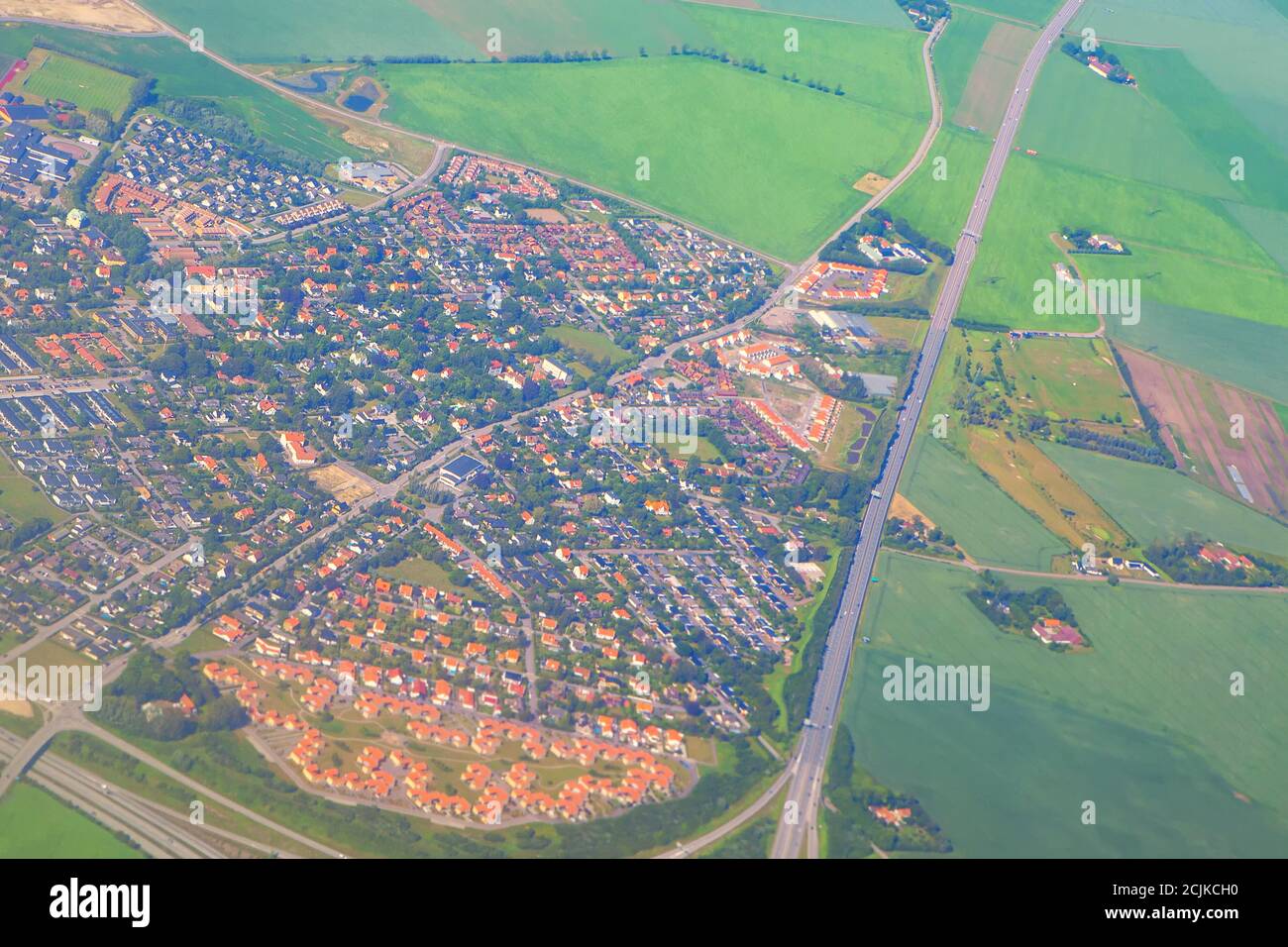 Aerial suburb view and green fields Stock Photo - Alamy
