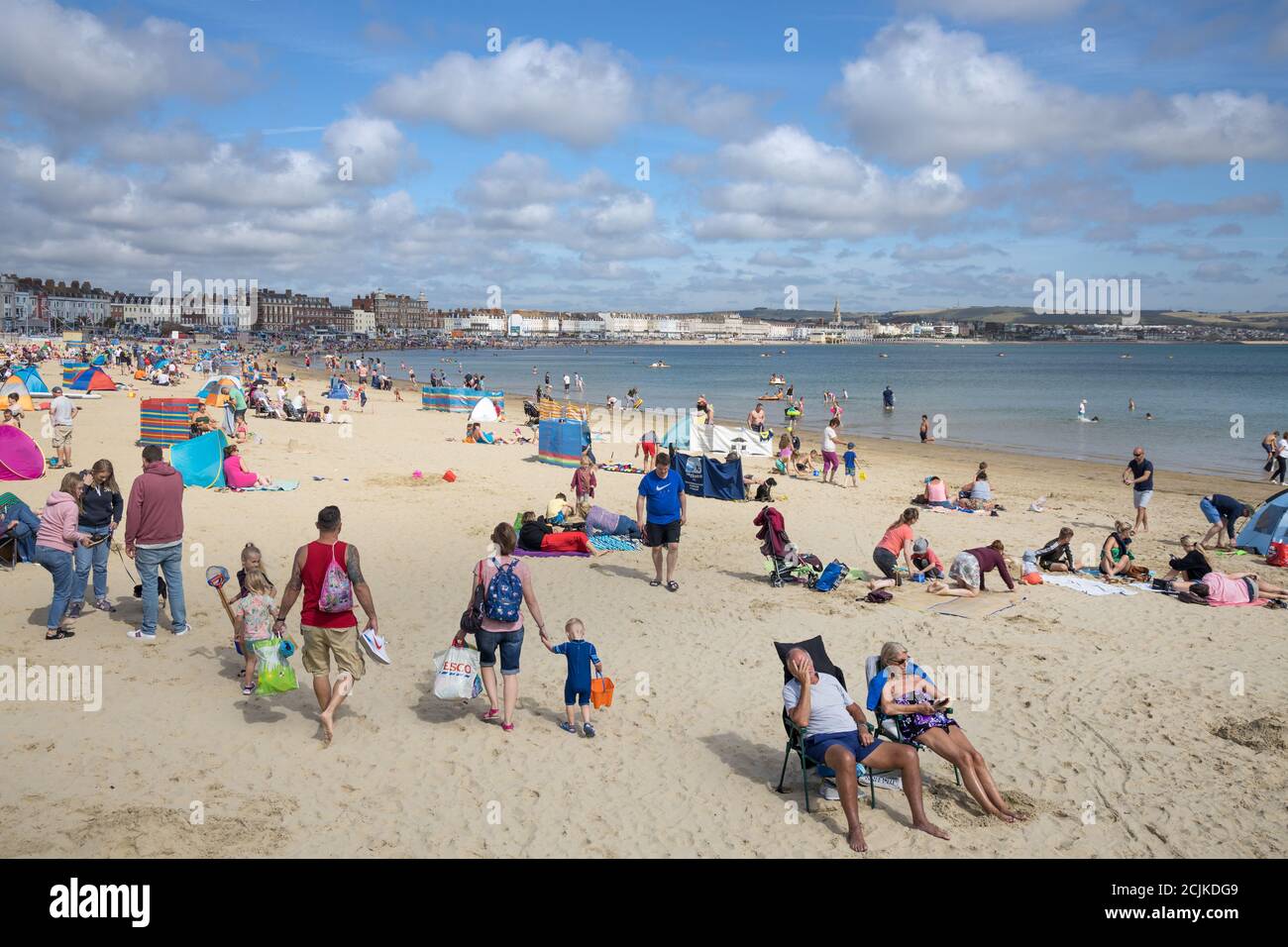Holidaymakers on the beach, Weymouth, Jurassic Coast, Dorset, England, UK Stock Photo