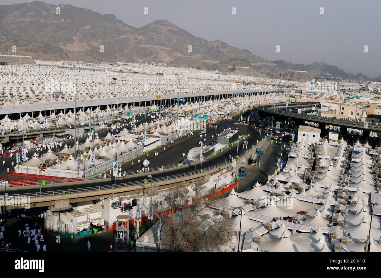 Muslim Pilgrims Walk Towards Their Tents In Mina Ahead Of Annual Haj Pilgrimage Near The Holy City Of Mecca Saudi Arabia August 19 2018 Reuters Zohra Bensemra Stock Photo Alamy