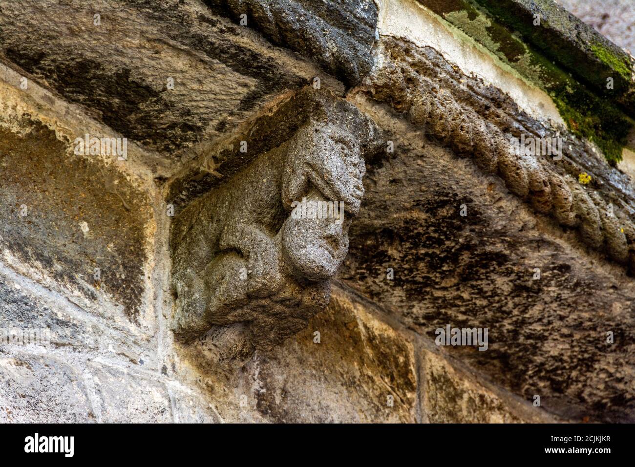 Mauriac, sculpture (modillon) of Notre-Dam-des-Miracles, Cantal department, Auvergne Rhone Alpes, France Stock Photo
