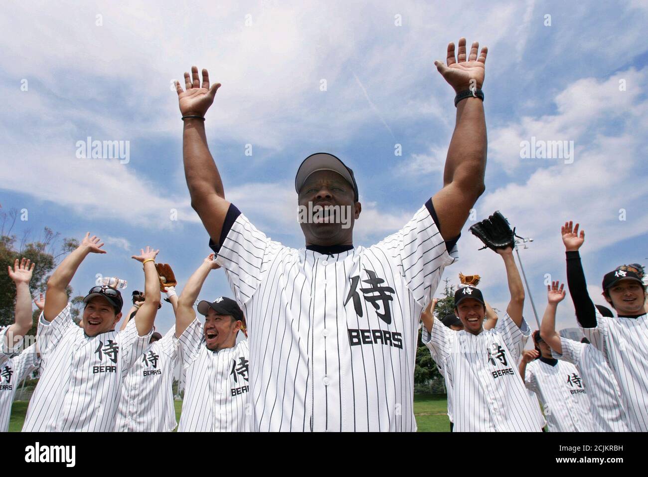 Japan Samurai Bears Manager And Former Montreal Expos Player Warren Cromartie C Leads Players In A Drill At The End Of A Baseball Clinic In Los Angeles May 17 05 The Samurai
