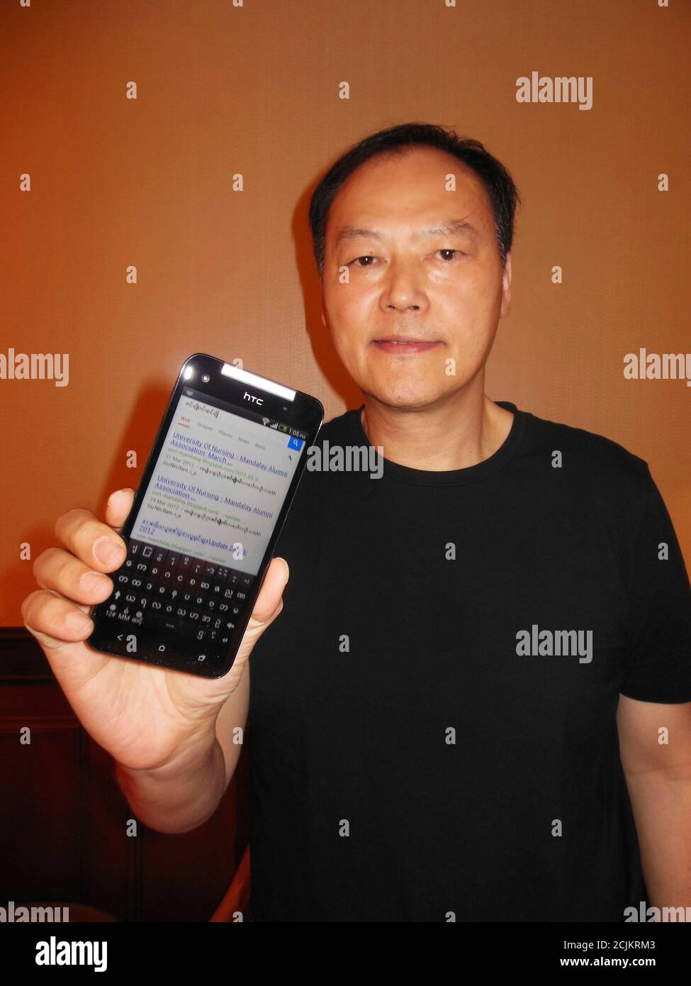 https www alamy com peter chou holds one of his devices sporting a new myanmar font ahead of mondays launch of the product in yangon january 13 2013 chou ceo of taiwan smartphone company htc corp will on monday launch what he hopes will be a major boost to both a backward tech sector in myanmar his country of birth and to his companys share of one of the few untapped mobile markets a phone that locals can use out of the box to match interview myanmar telecomshtc reutersjeremy wagstaff myanmar tags business science technology telecoms image372917219 html