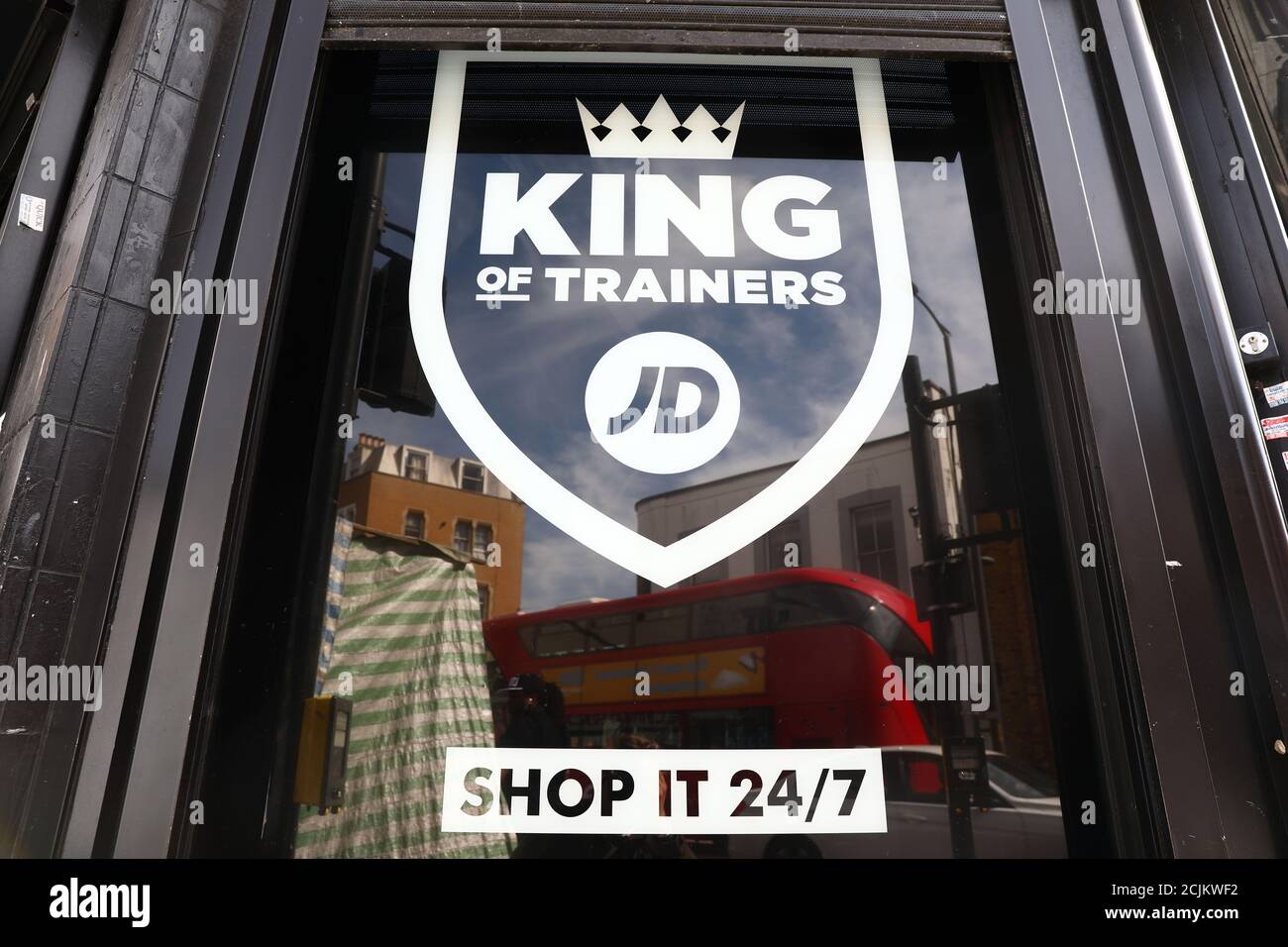 A sign for a JD Sports store is displayed in a window in London, Britain April 11, 2017.  Shares in Britain's JD Sports Fashion Plc climbed to a record high after strong demand for leisure clothing helped to drive a 55 percent rise in headline annual pretax profit, its biggest increase in eight years REUTERS/Neil Hall Stock Photo