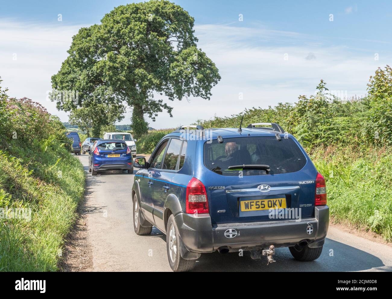 Congested country road between Lerryn & Lostwithiel during summer holiday period in mid-Cornwall, UK, during 2020 Covid-19 outbreak. Stock Photo