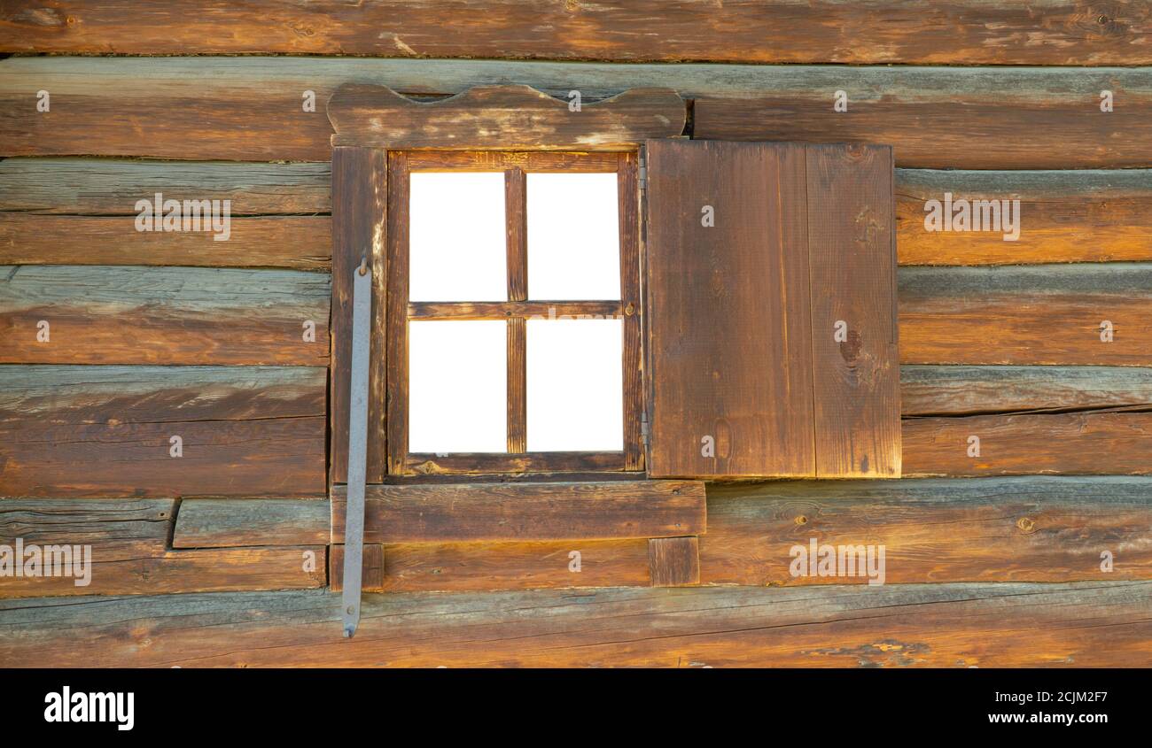 old wooden Windows with open shutters. Old Russian country style. Stock Photo