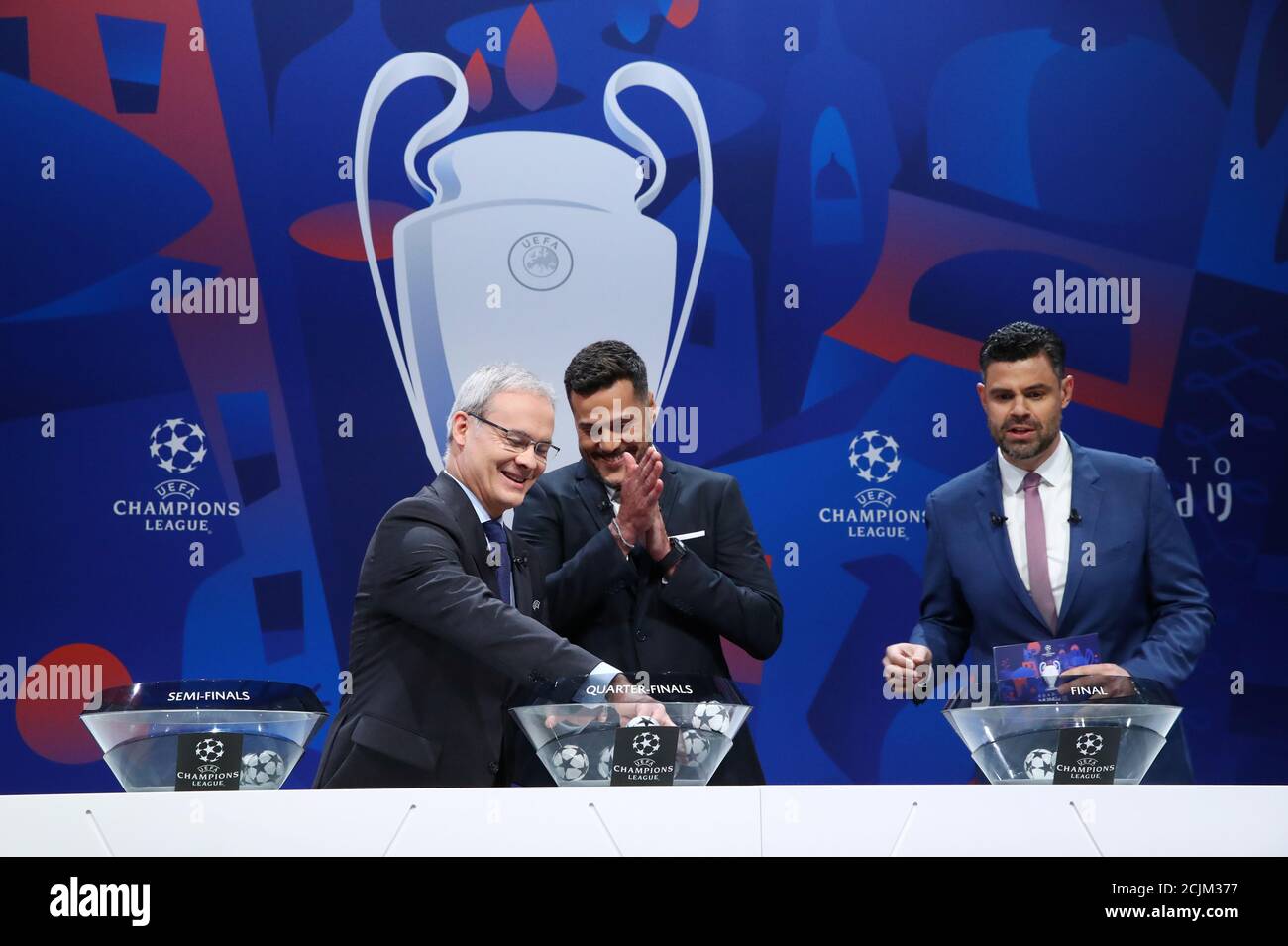 Soccer Football - Champions League - Quarter Finals and Semi Finals Draw -  Nyon, Switzerland - March 15, 2019 UEFA Competitions Director Giorgio  Marchett with UEFA Champions League ambassador Julio Cesar and