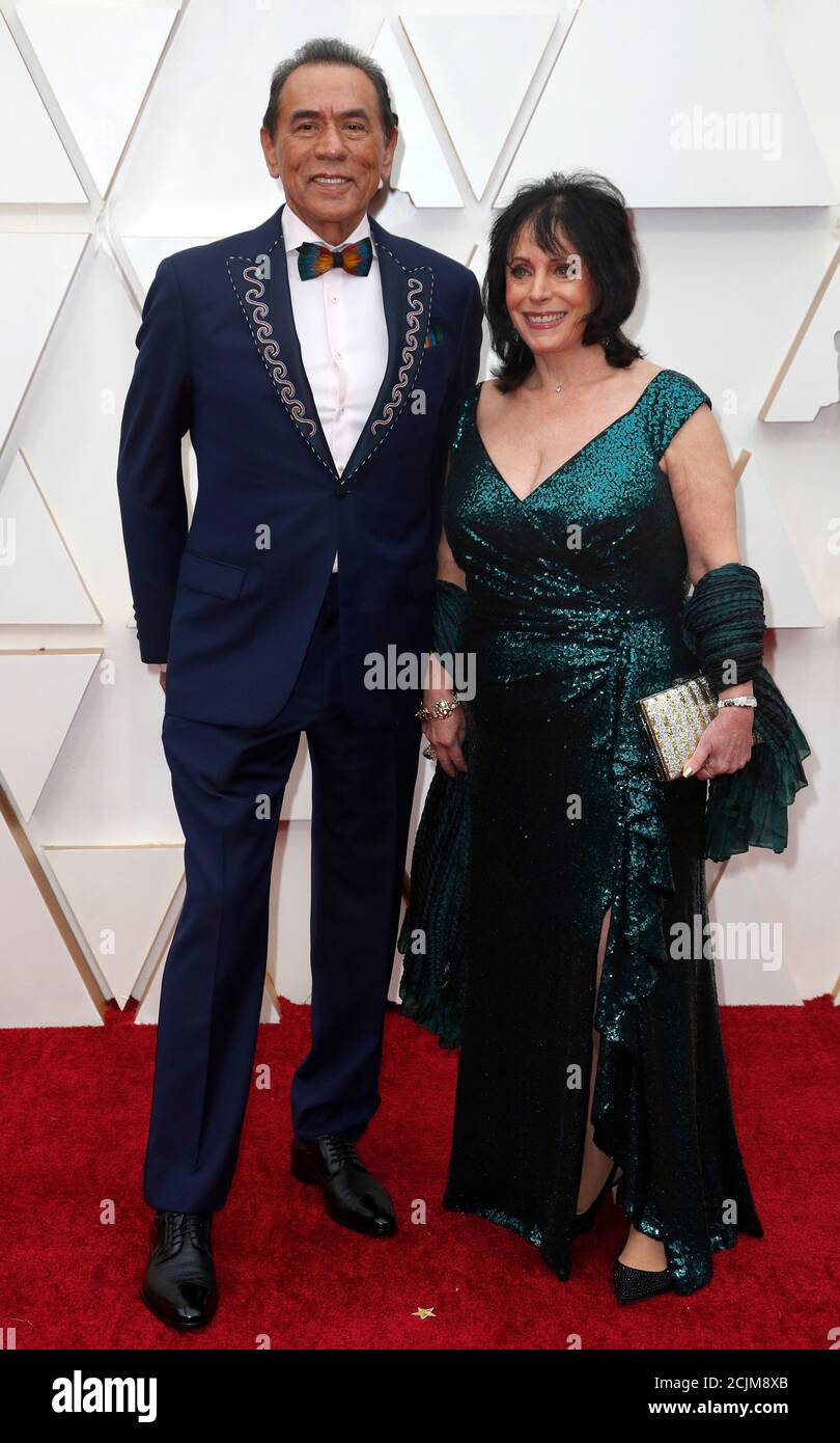 Wes Studi and his wife Maura Dhu Studi pose on the red carpet during