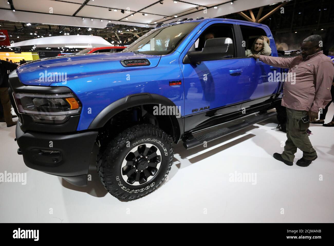 A woman sits in a Ram 2500 truck at the Canadian International Auto Show in  Toronto, Ontario, Canada February 18, 2020. REUTERS/Chris Helgren Stock  Photo - Alamy