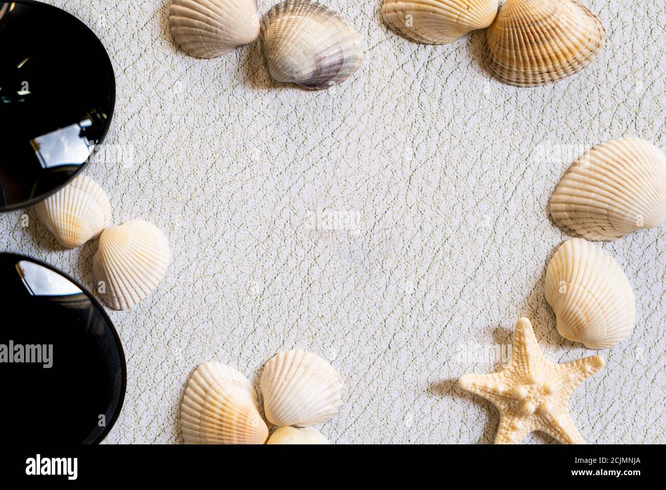 Sea, shells and glasses, sea star beach vacation Stock Photo