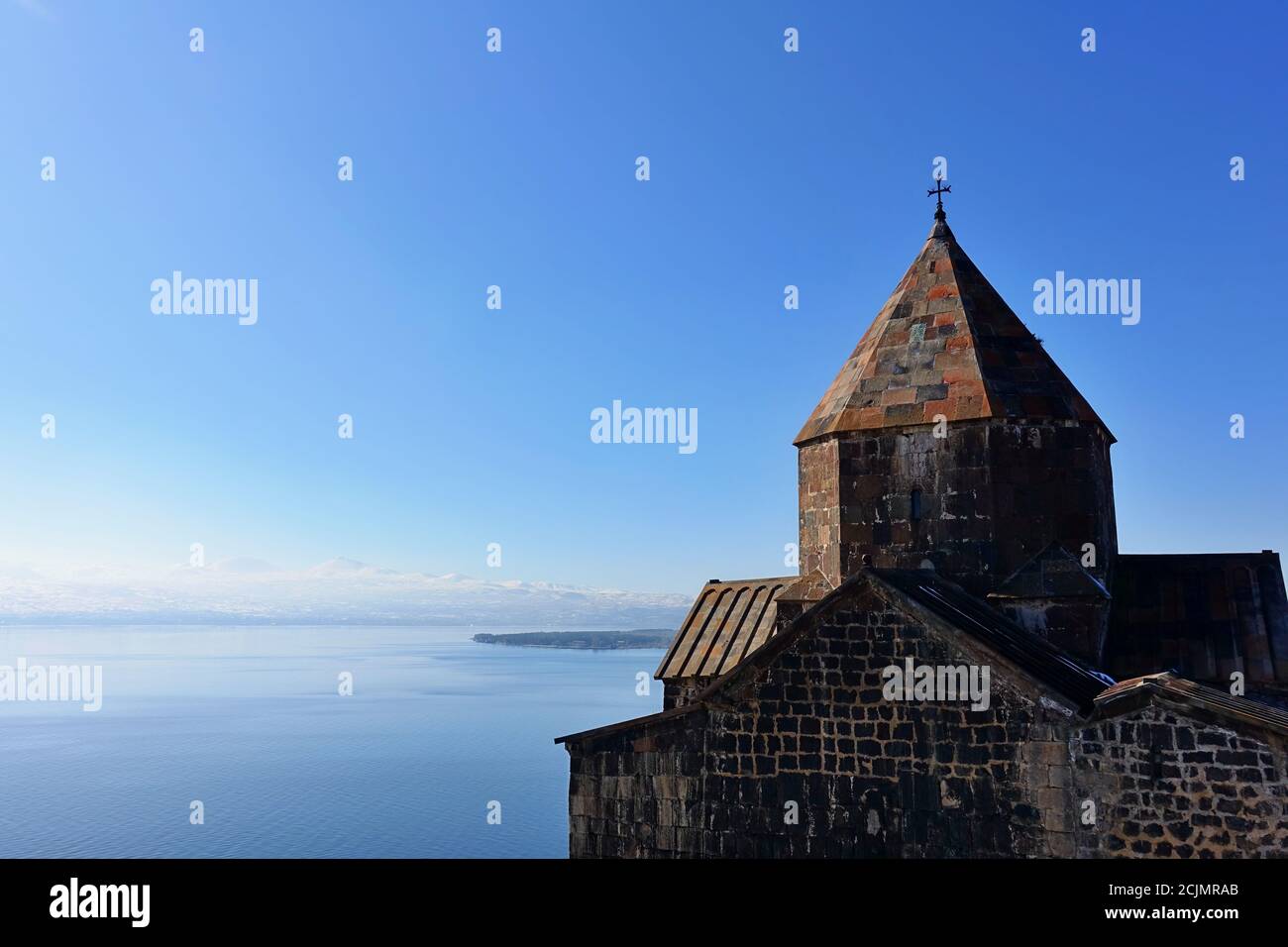 The Sevanavank church at Lake Sevan in the Gegharkunik Province of Armenia. In the beginning of winter Stock Photo