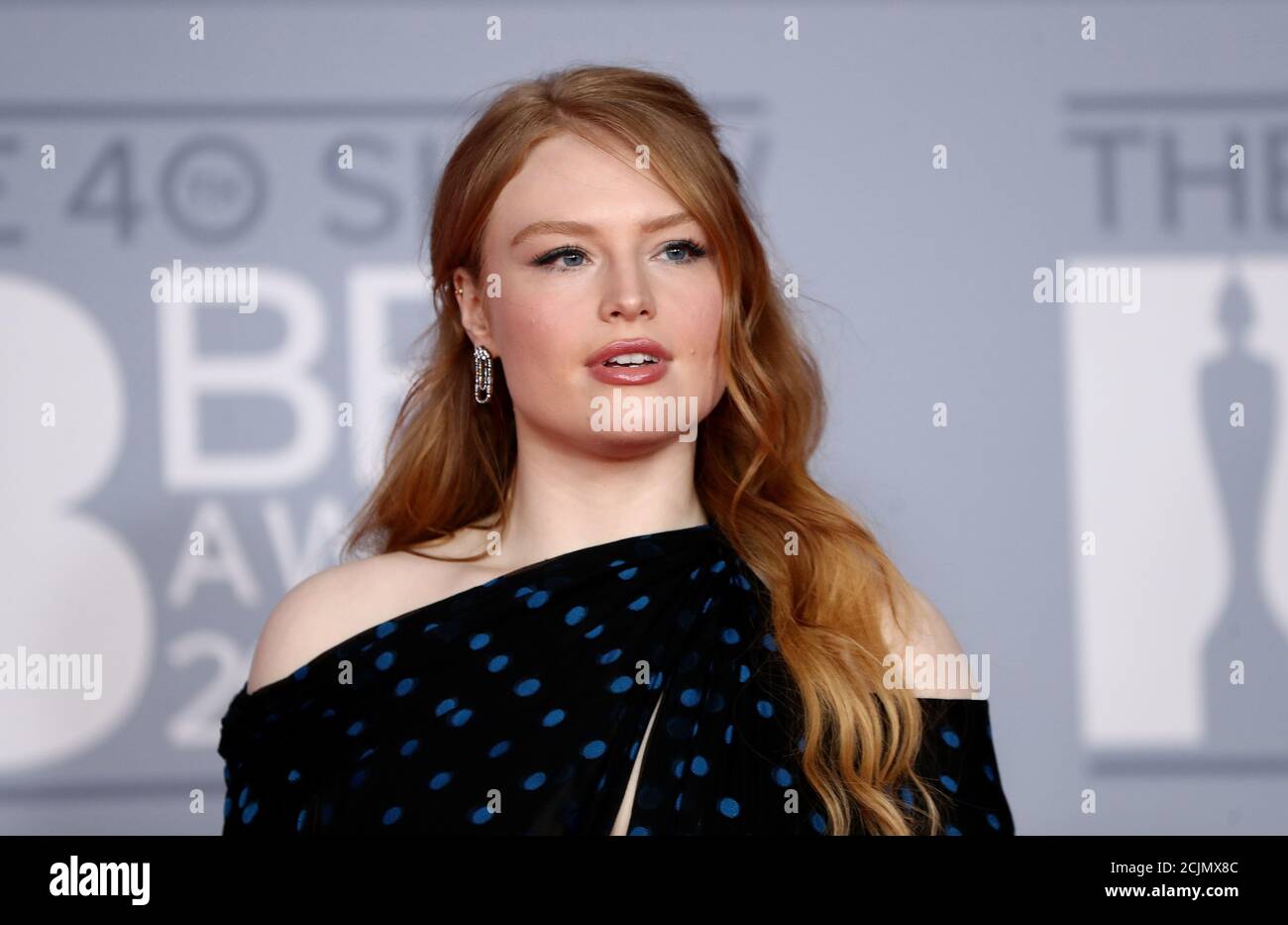 Freya Ridings poses as she arrives for the Brit Awards at the O2 Arena