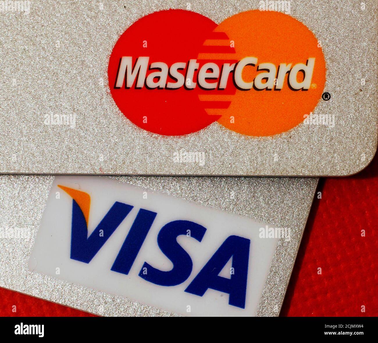MasterCard and VISA credit cards are seen in this illustrative photograph  taken in Hong Kong December 8, 2010.This logo has been updated and is no  longer in use. REUTERS/Bobby Yip (CHINA -