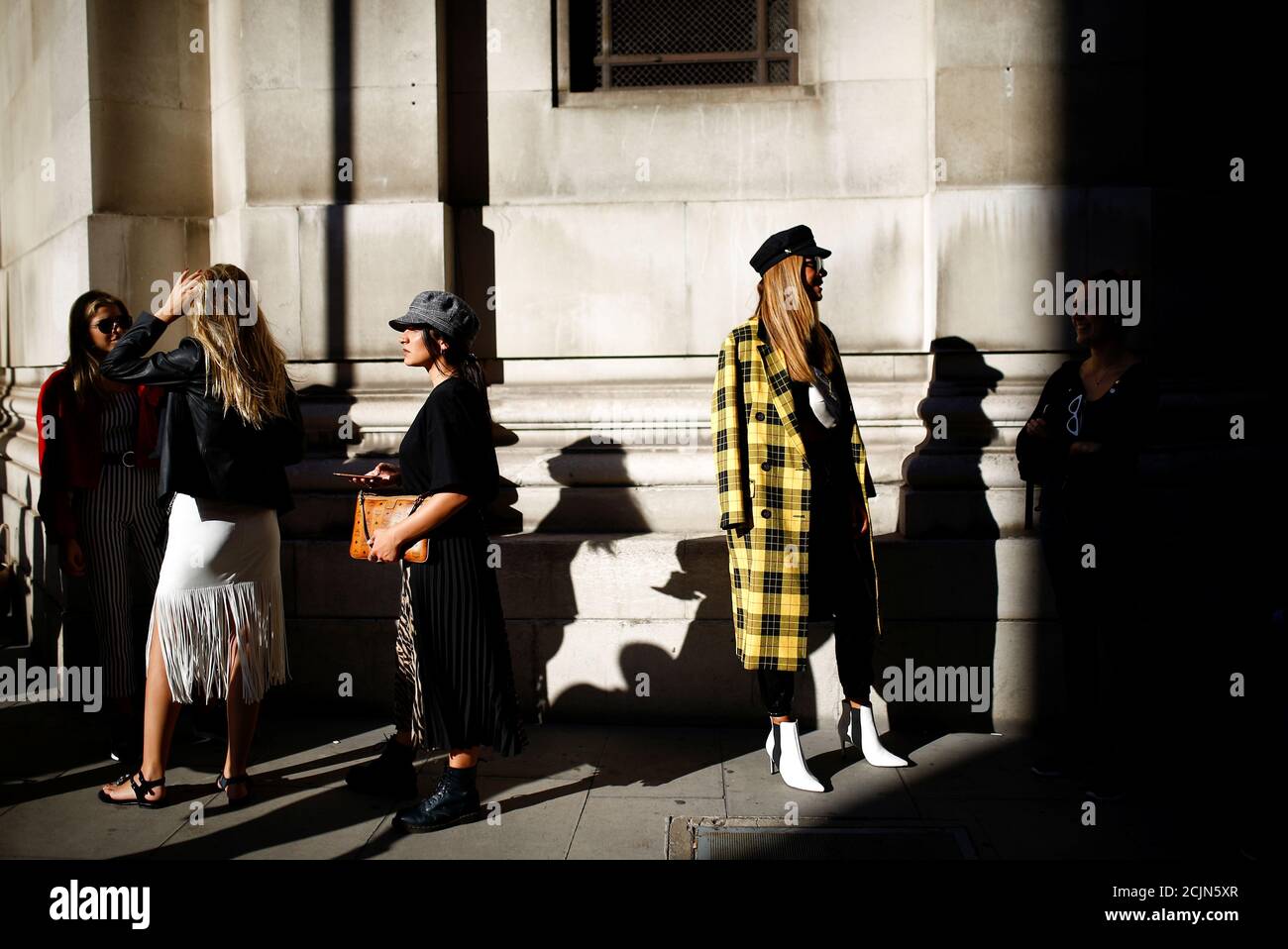 People gather outside the Freemason's Hall for catwalk shows at London  Fashion Week Women's in London, Britain September 16, 2018. REUTERS/Henry  Nicholls Stock Photo - Alamy