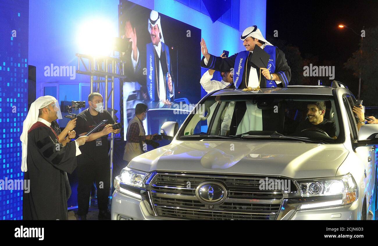 (200915) -- AHMADI GOVERNORATE, Sept. 15, 2020 (Xinhua) -- A student attends a drive-through graduation ceremony at Kuwait Technical College (K-Tech) in Ahmadi Governorate, Kuwait, Sept. 9, 2020. Kuwait Technical College (K-Tech) celebrated its students' graduation in the first of its kind drive-through ceremony. More than 125 students gathered in the university's parking lot to receive their degree while driving-through to the president and keeping social distancing protocols in place. TO GO WITH 'Feature: Kuwaiti students celebrate graduation with drive-through, virtual ceremonies am Stock Photo