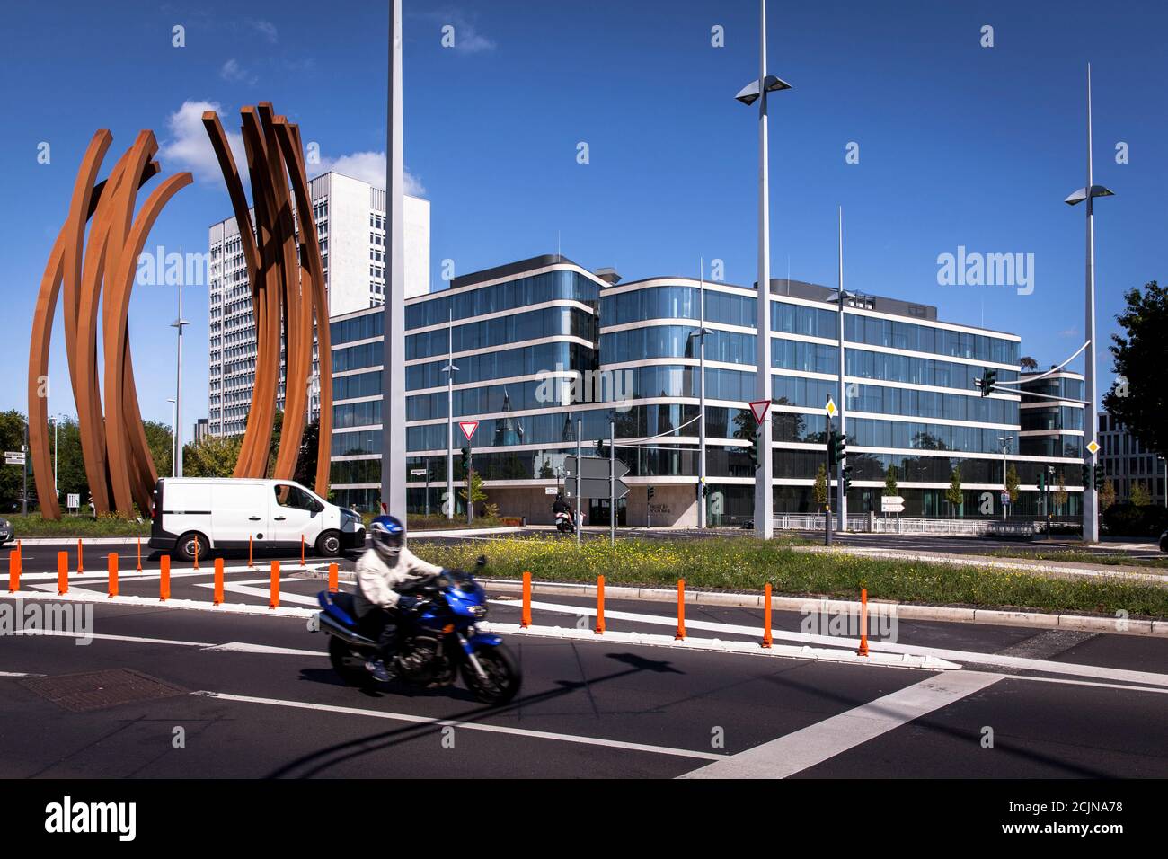 steel sculpture ARC'89 by Bernar Venet and the building of the FGS trust company for foundation assets, Helmut-Schmidt square, Bonn, North Rhine-Westp Stock Photo